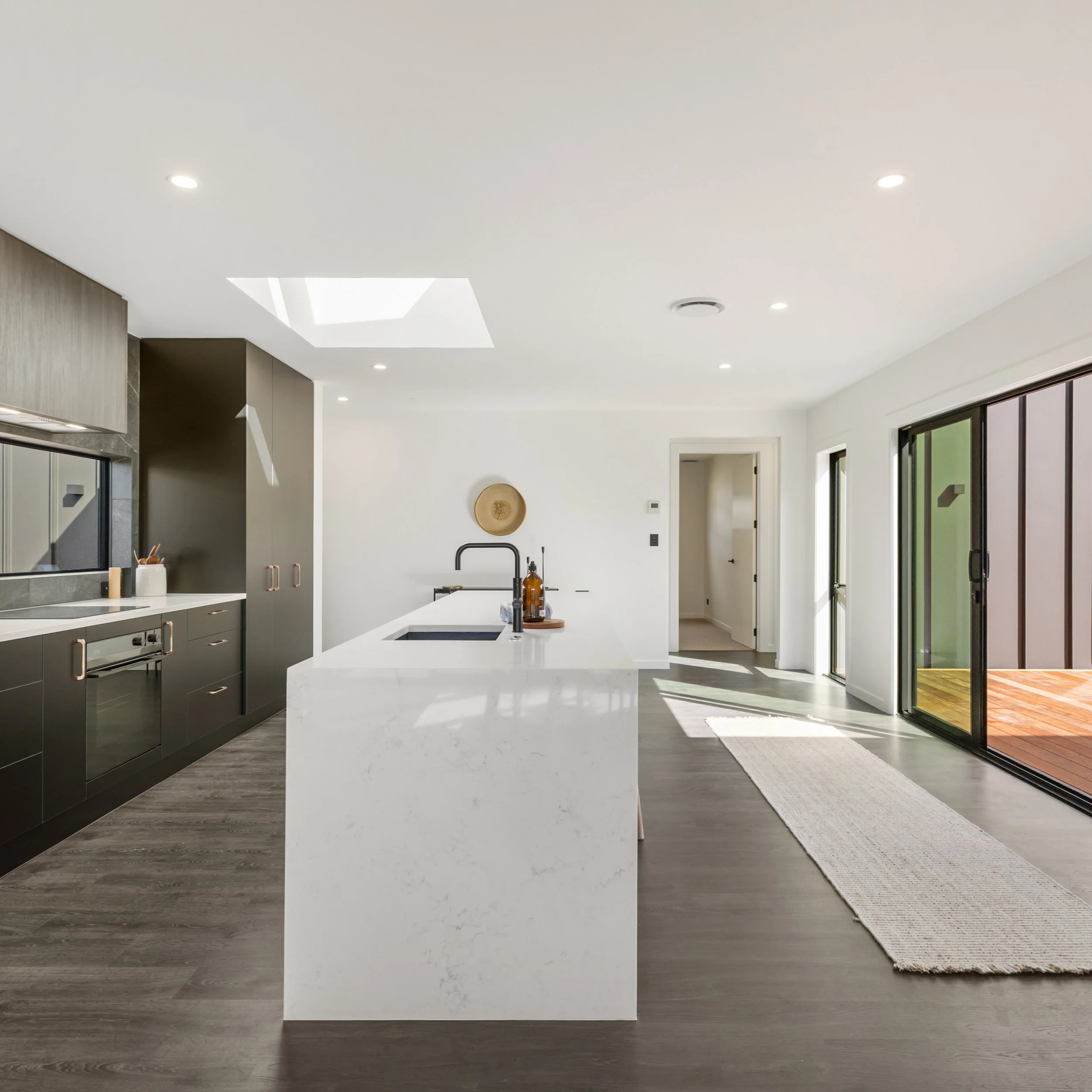 We style spaces. We don't fill them.

Considered pieces, natural light, and a clear flow to the deck do the rest. We kept the island mostly clear on purpose &mdash; it's the heart of the space.

#WanakaHomeStaging #WanakaRealEstate #HomeStagingNZ #Wa