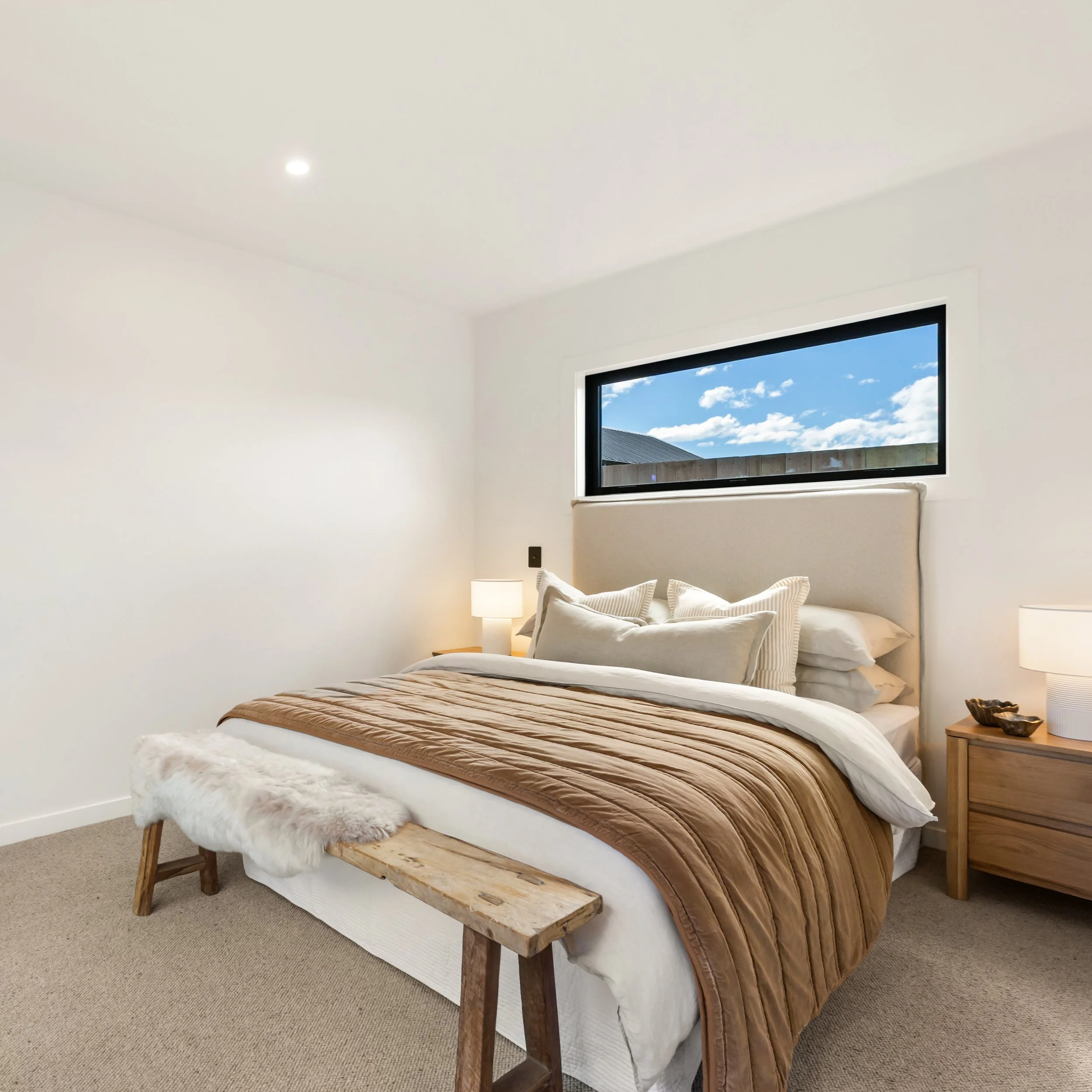 Calm, warm, and carefully considered.

Linen in soft neutrals, bedside lamps for warmth, nothing crowding the doors to the deck. A real bed made properly.

#WanakaHomeStaging #BedroomStyling #HomeStagingNZ #WanakaProperty #InteriorStyling #CentralOta