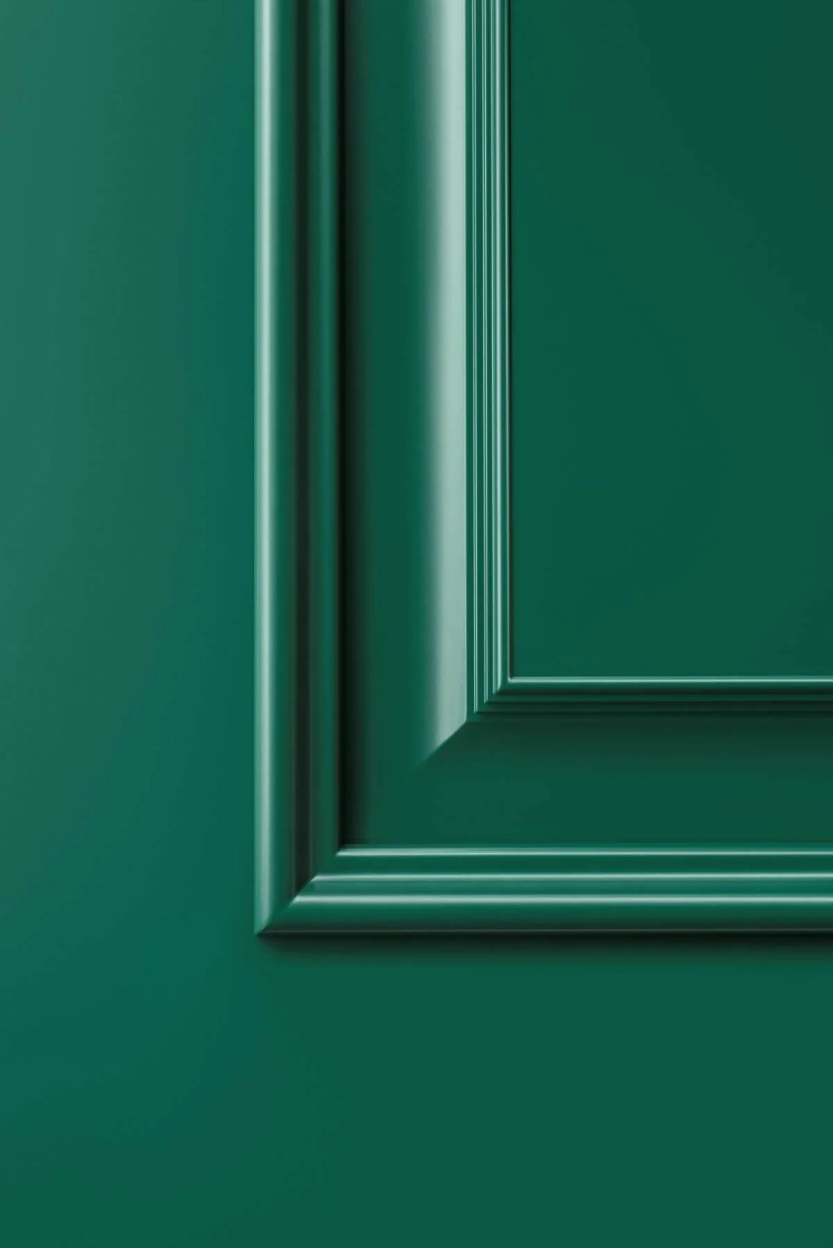 Close-up of a dark green textured door frame with detailed molding.
