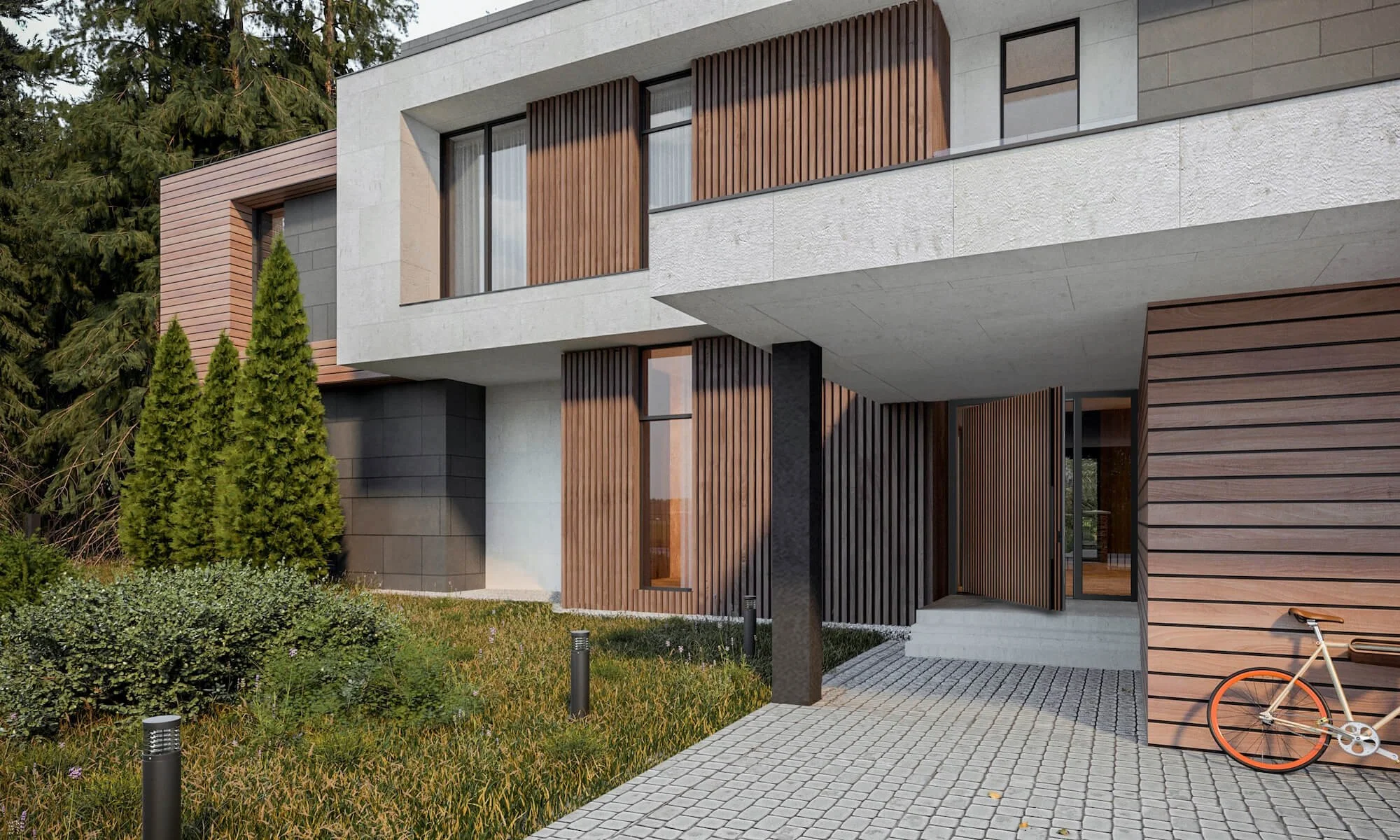 Modern house with concrete, wood, and black exterior finishes, with tall green trees and a bicycle in the front yard.