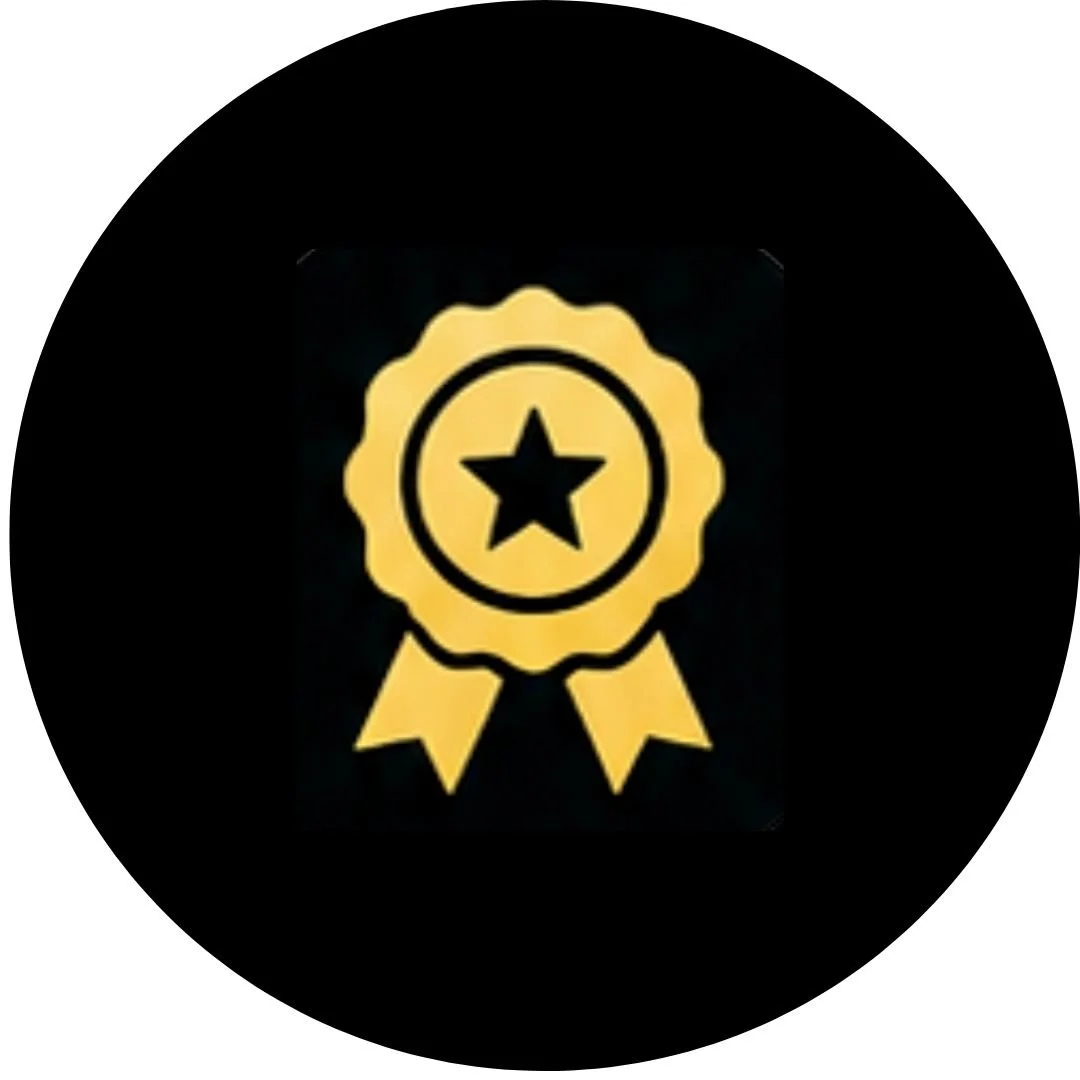 Gold award ribbon with a star in the center on a black background.