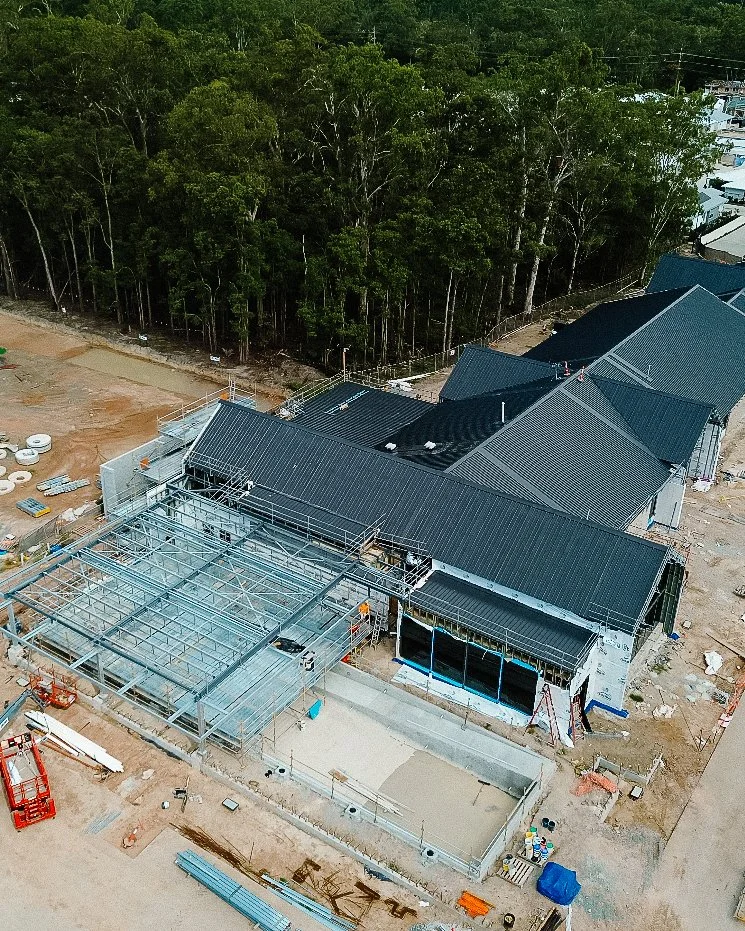 Aerial photography Brisbane — drone media production capturing a construction or roofing service business by Elevate Digital HQ