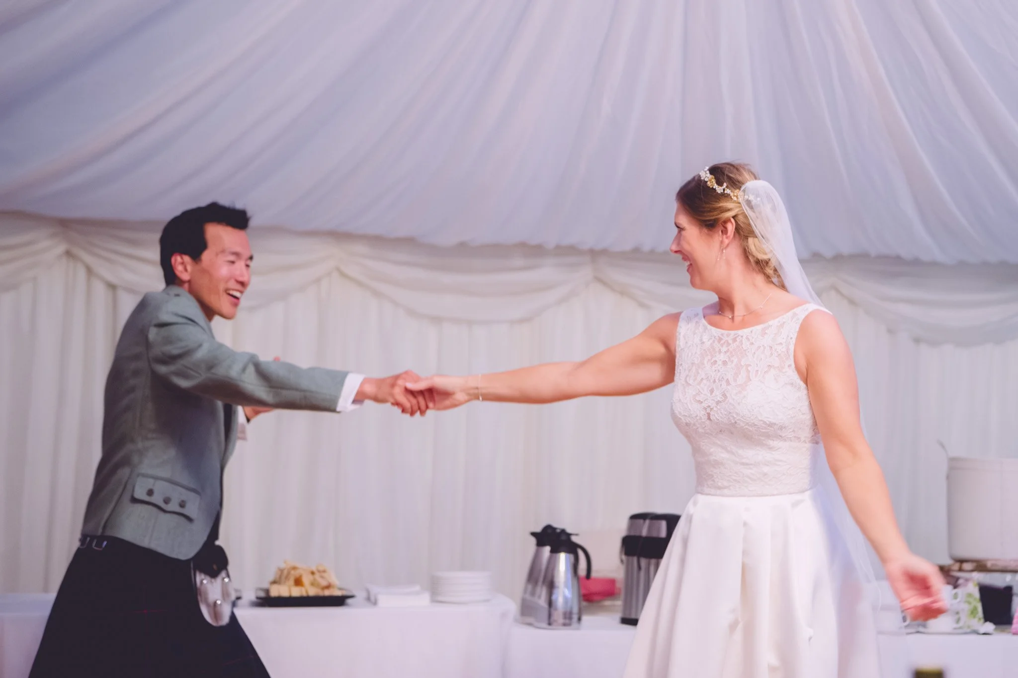 Bride and groom dancing