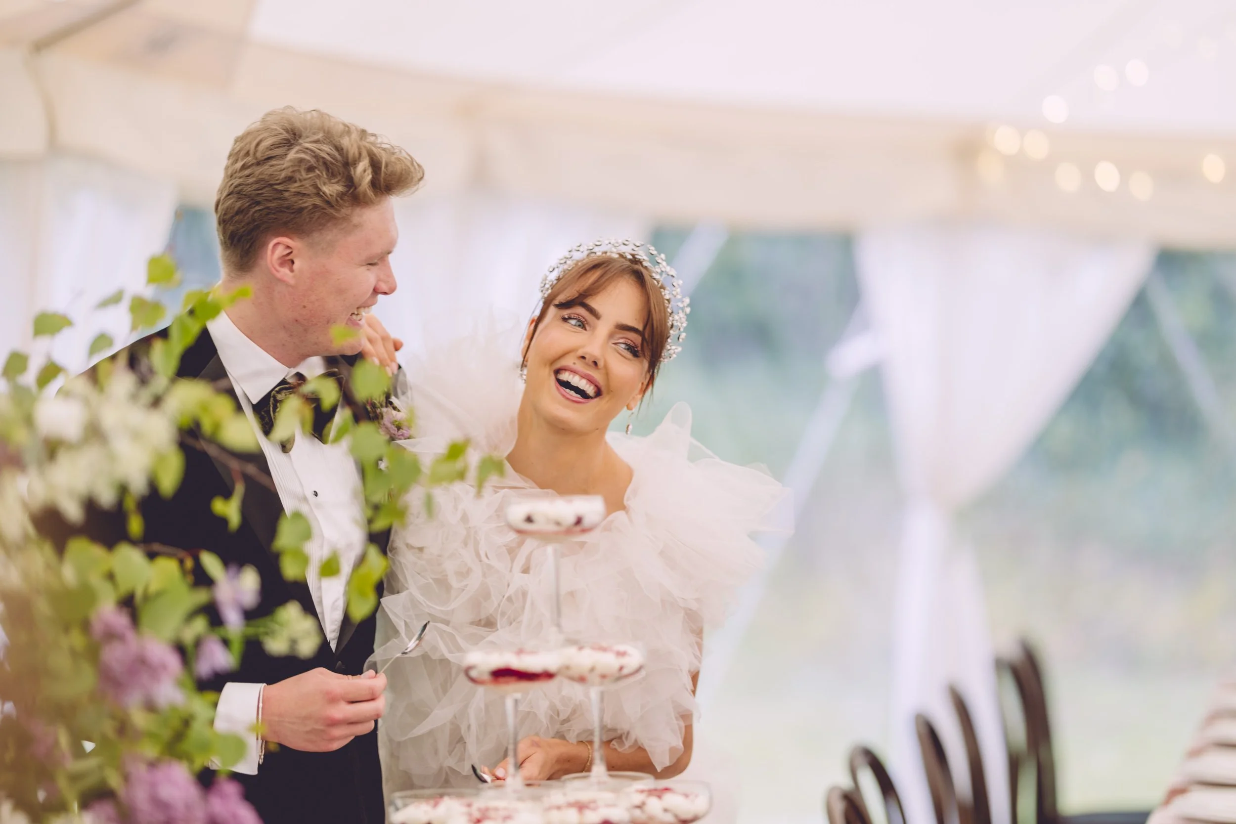 Bride & groom laughing