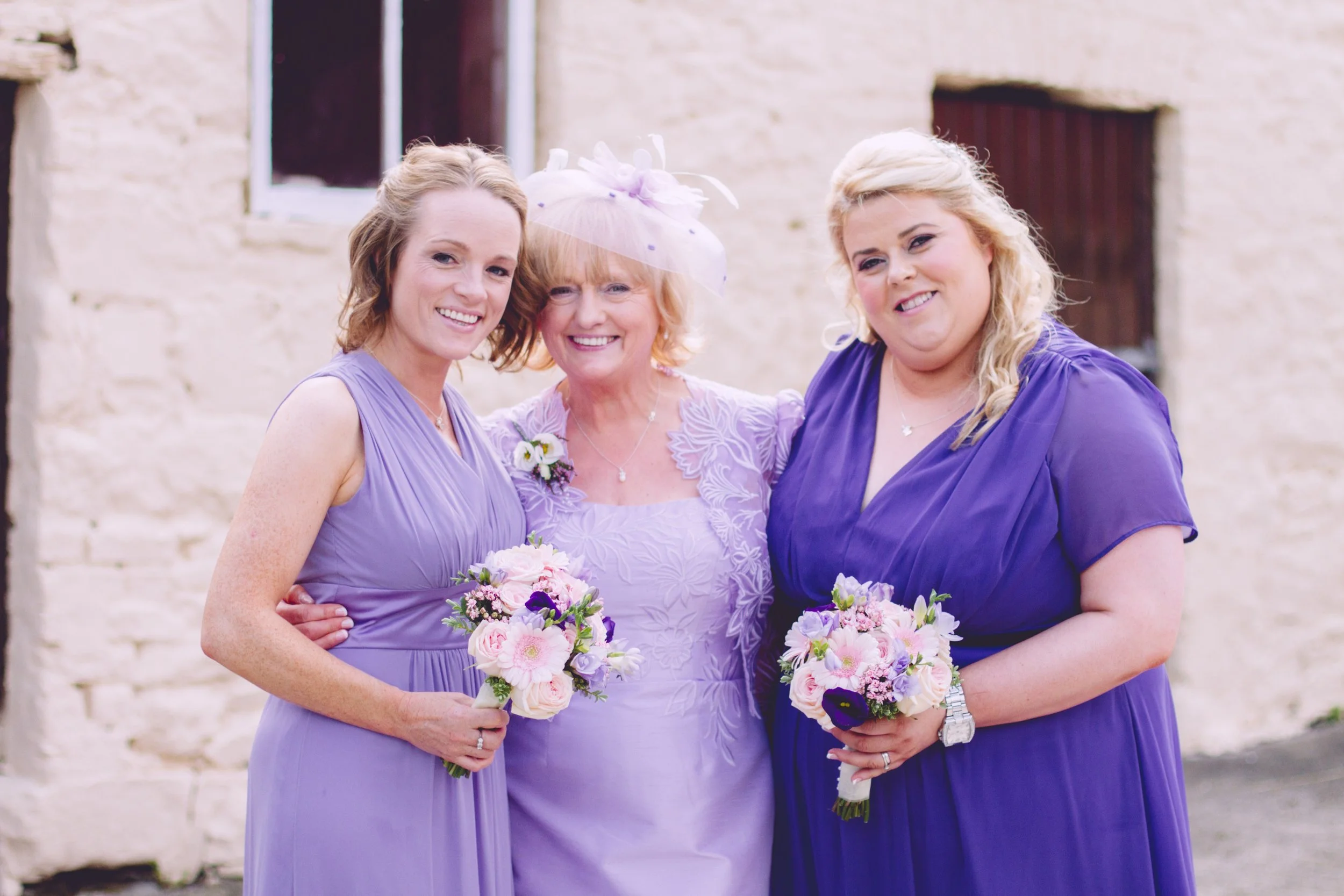 Bridesmaides with brides mum
