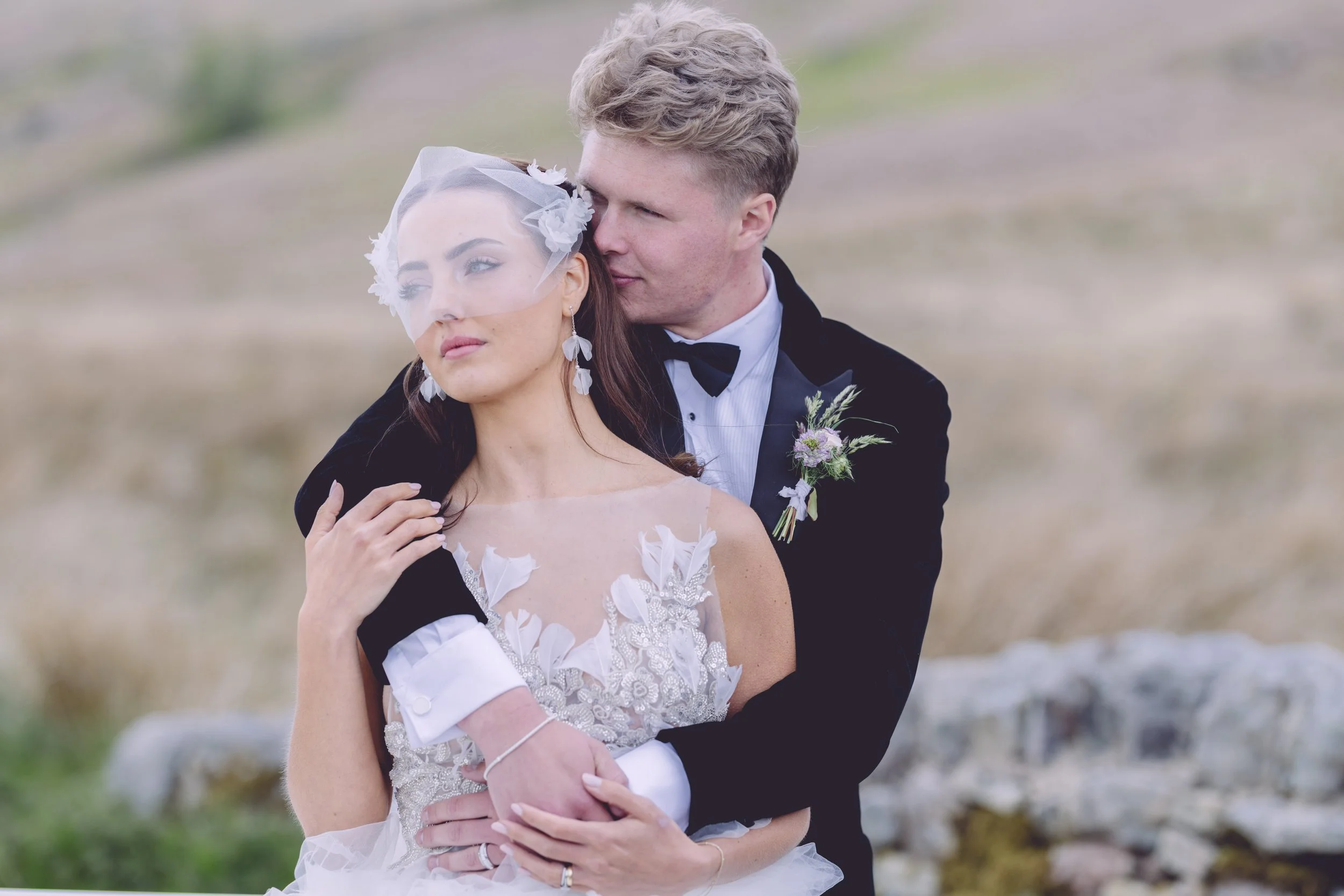 Bride and groom embrace