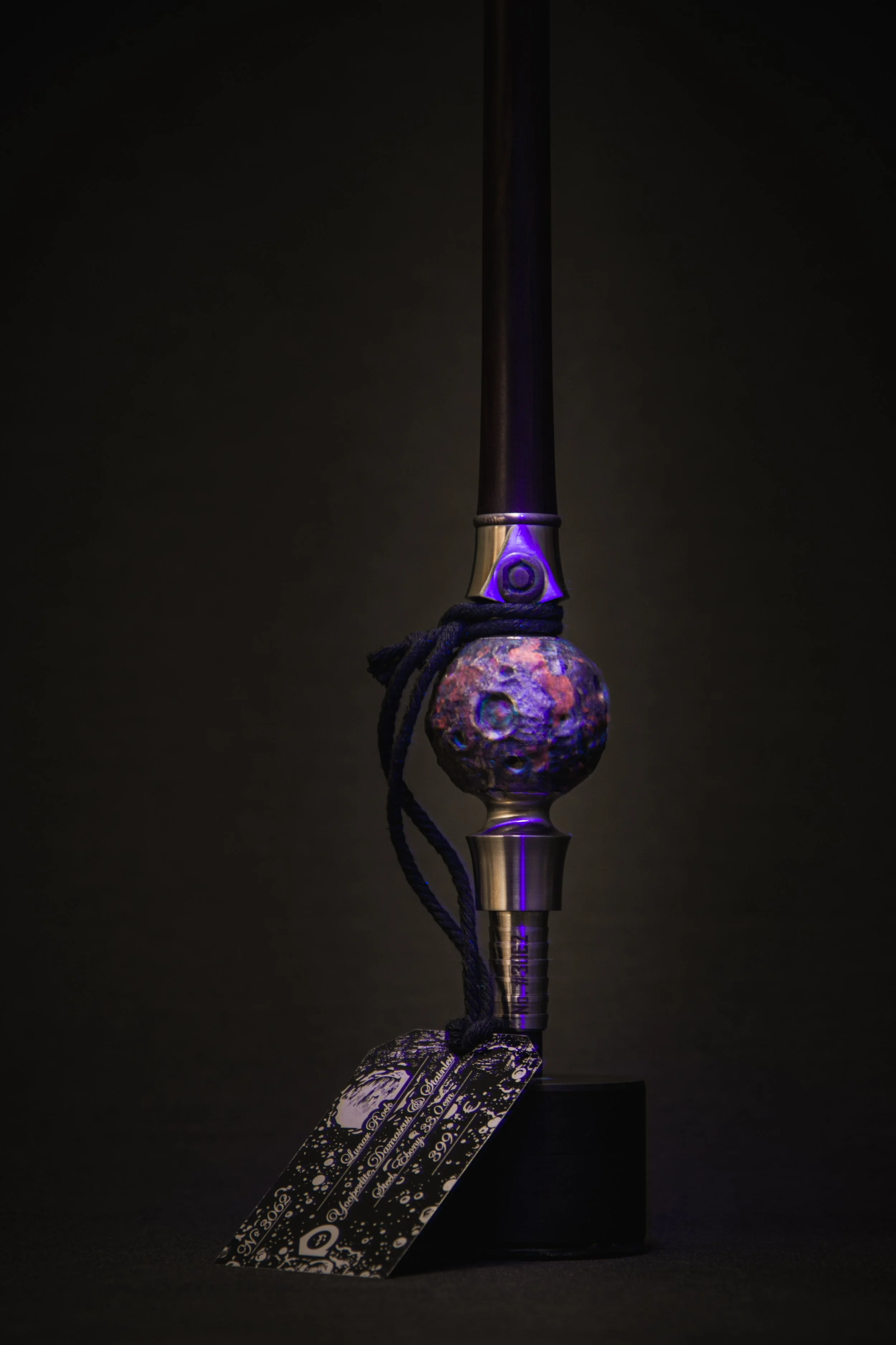 Luna Moon Hookah handle form yooperlite which is illuminated glowing in UV Light