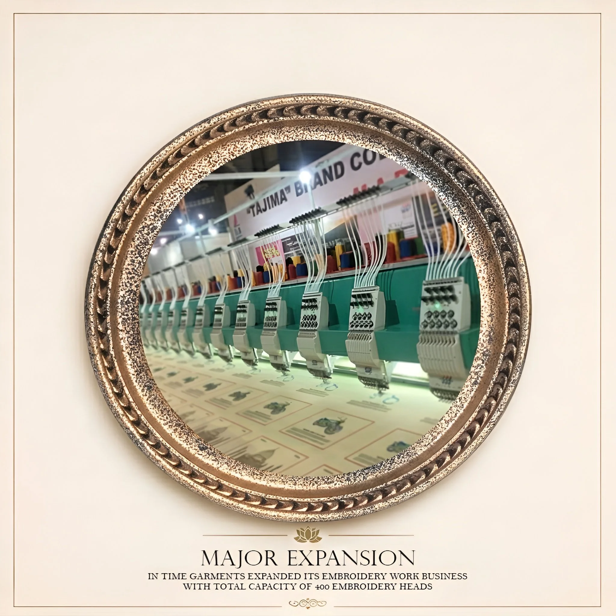 Close-up of a decorative, oval-shaped mirror with a gold and bronze textured frame, reflecting a store display with embroidery work and sewing supplies.