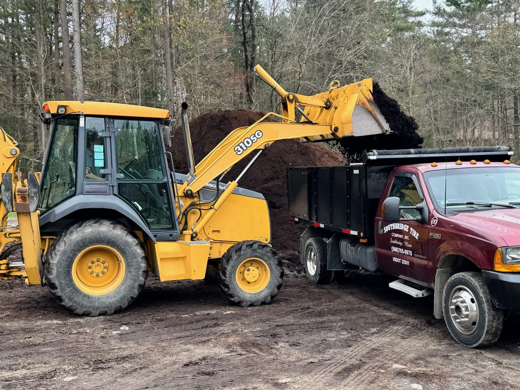 loading mulch for a customer delivery