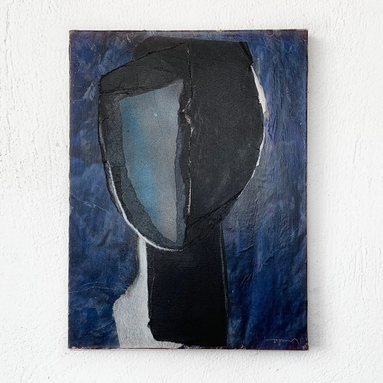 Abstract portrait painting of a face with a two-tone mask, set against a dark blue background.