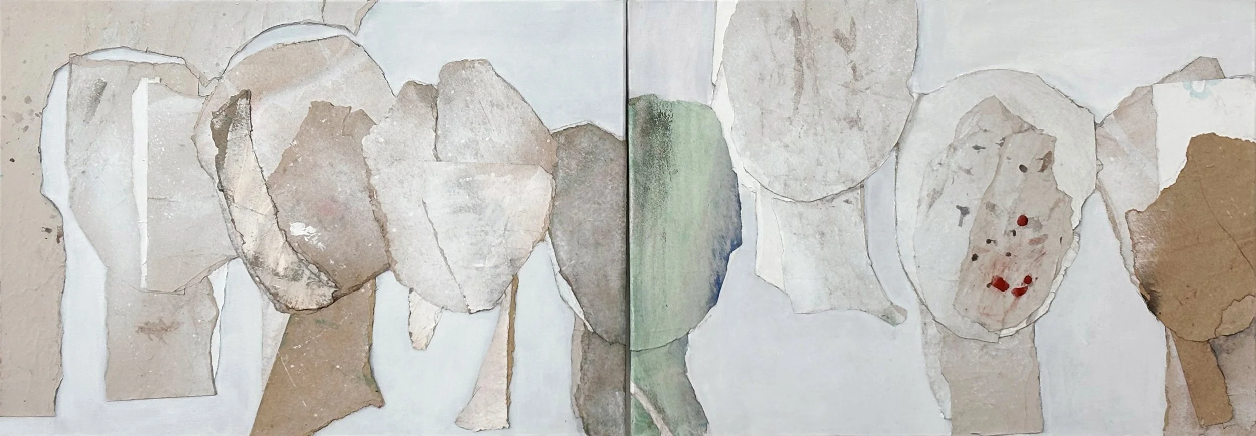 A collage of torn paper pieces arranged on a white background, with colored sections including green and red accents.