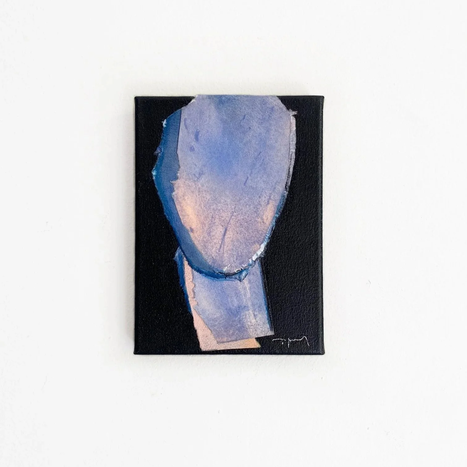 Abstract painting of a face with a large nose, using purple and blue hues, on a small black canvas.