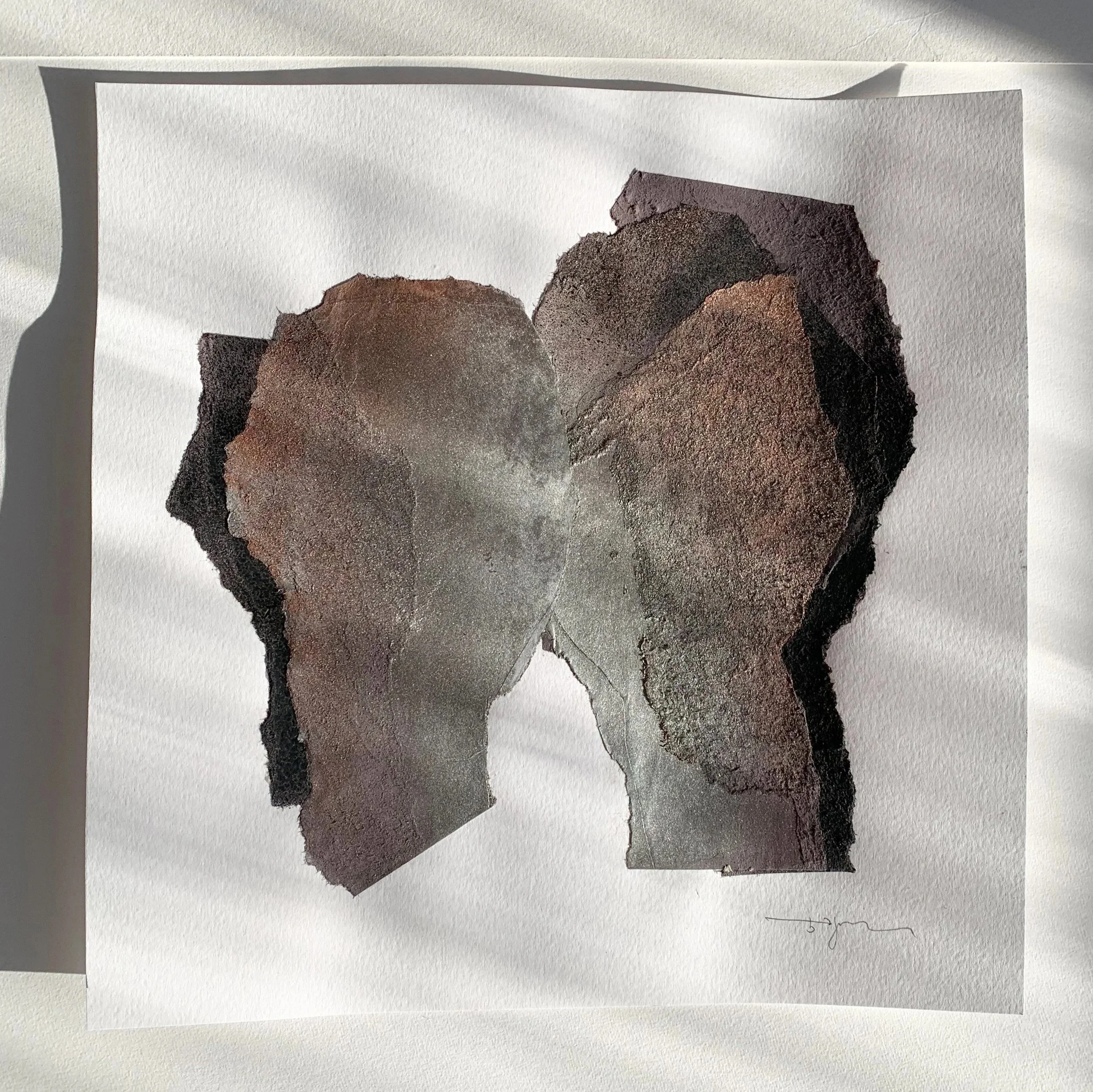 Abstract watercolor artwork featuring a silhouette of a person's profile in muted earth tones.