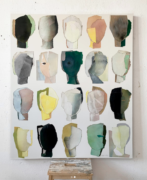 Watercolor painting featuring 20 abstract silhouettes of human heads in various muted and vibrant colors arranged in a 4x5 grid on a white canvas.