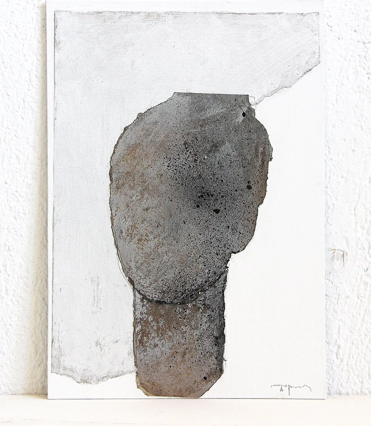 Abstract artwork of a faceless figure in earthy tones, with a torn paper effect at the top and bottom