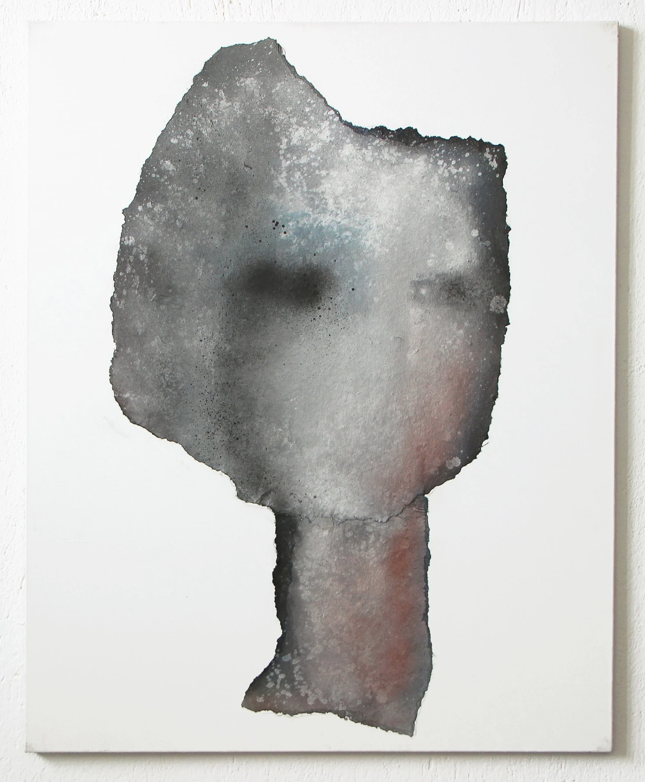 Abstract black and gray watercolor painting on white canvas, resembling an irregularly shaped figure with a narrower bottom and a broad top.