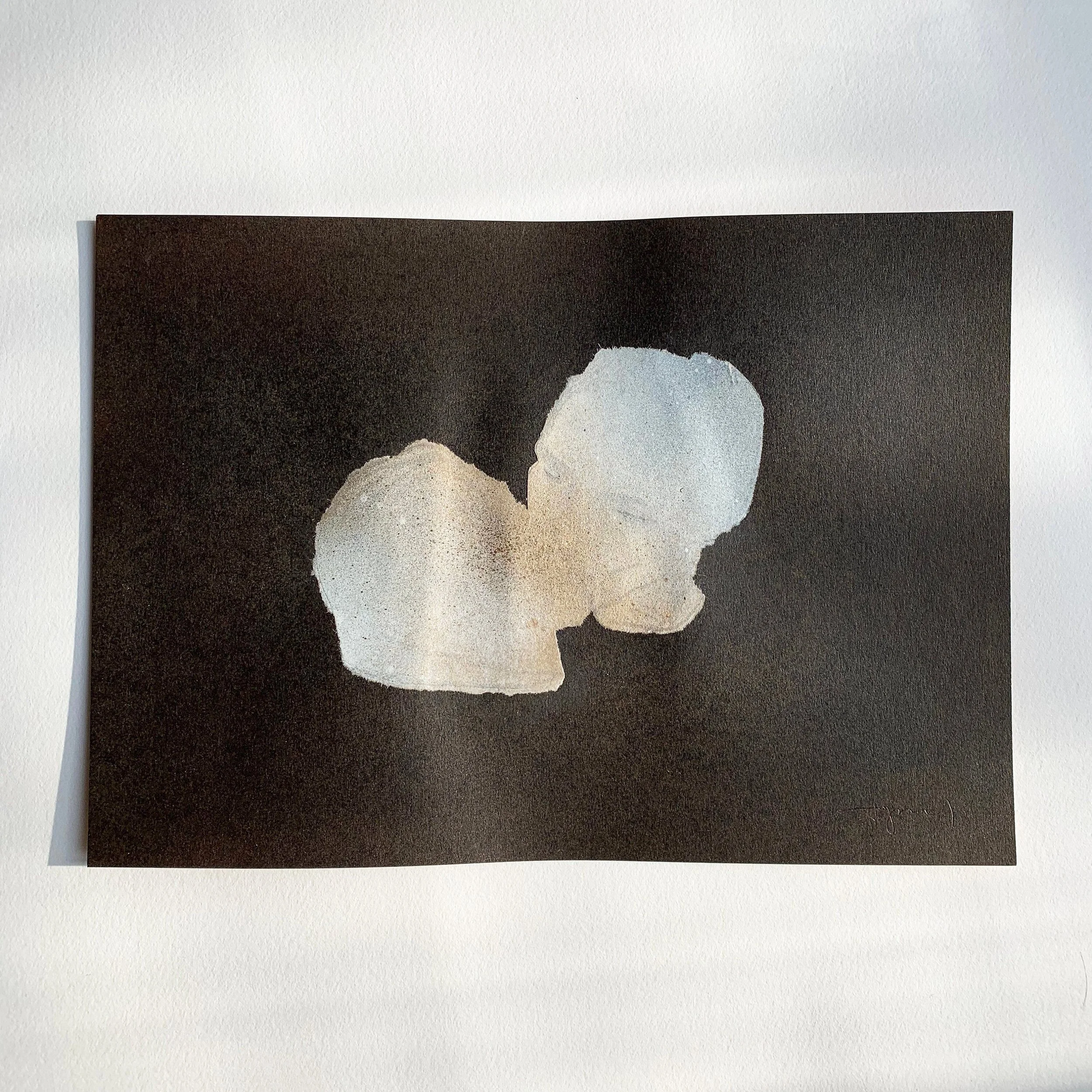 Kiss  painting  made in mixed media with black paper and uneven white or light-colored heads, small contemporary artwork
