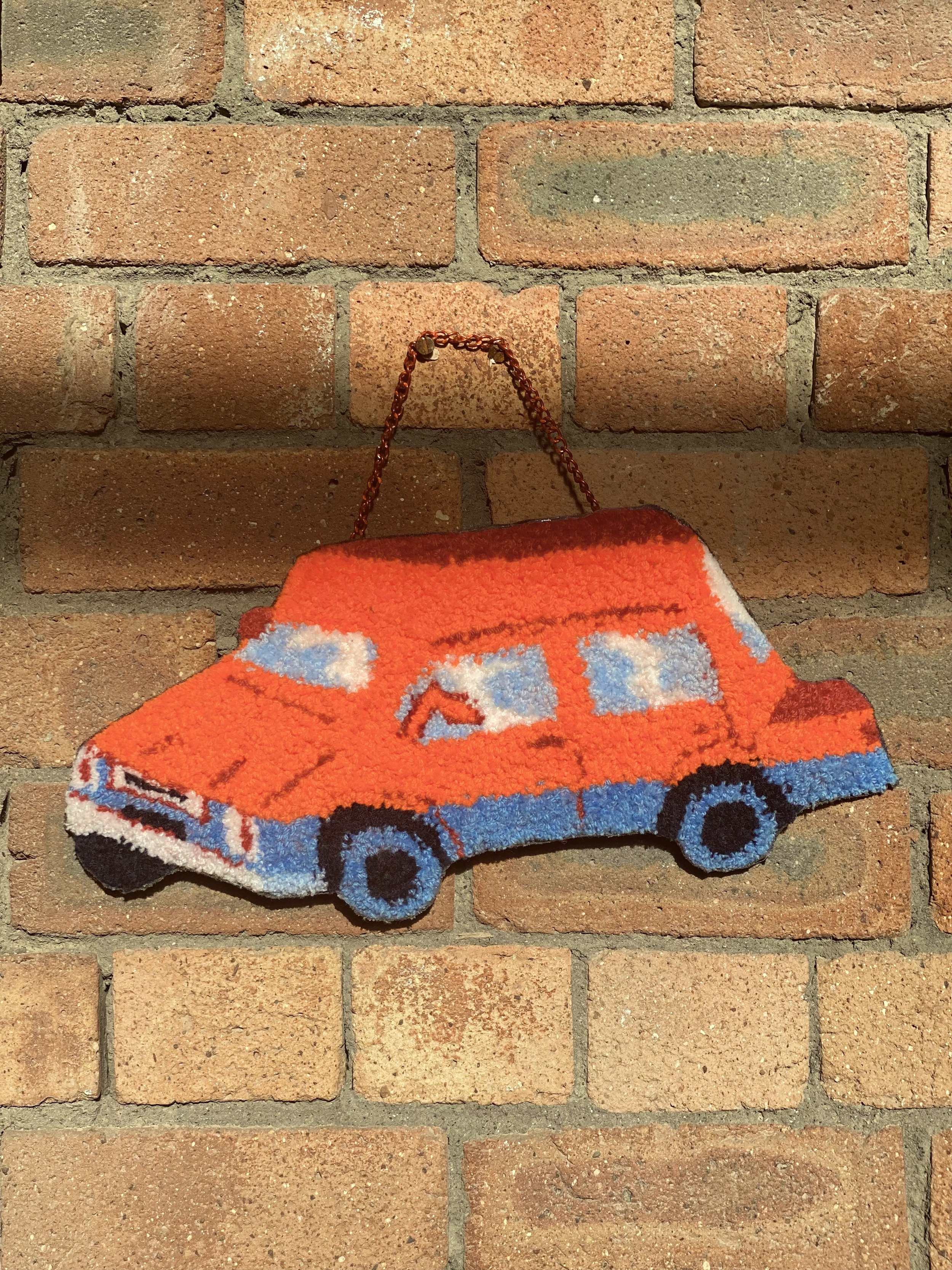 Orange car wall hanging