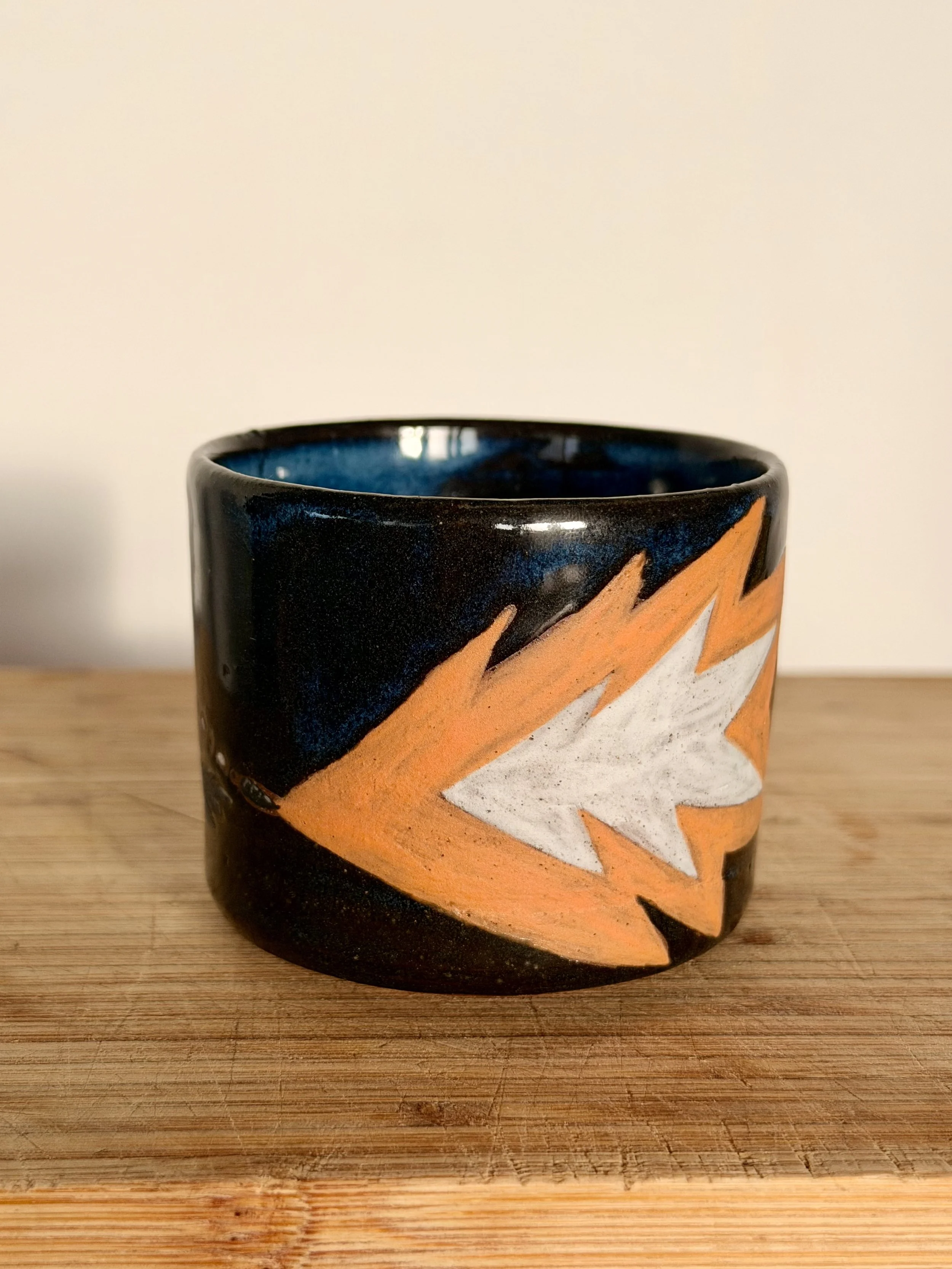 Duel at dusk espresso cup