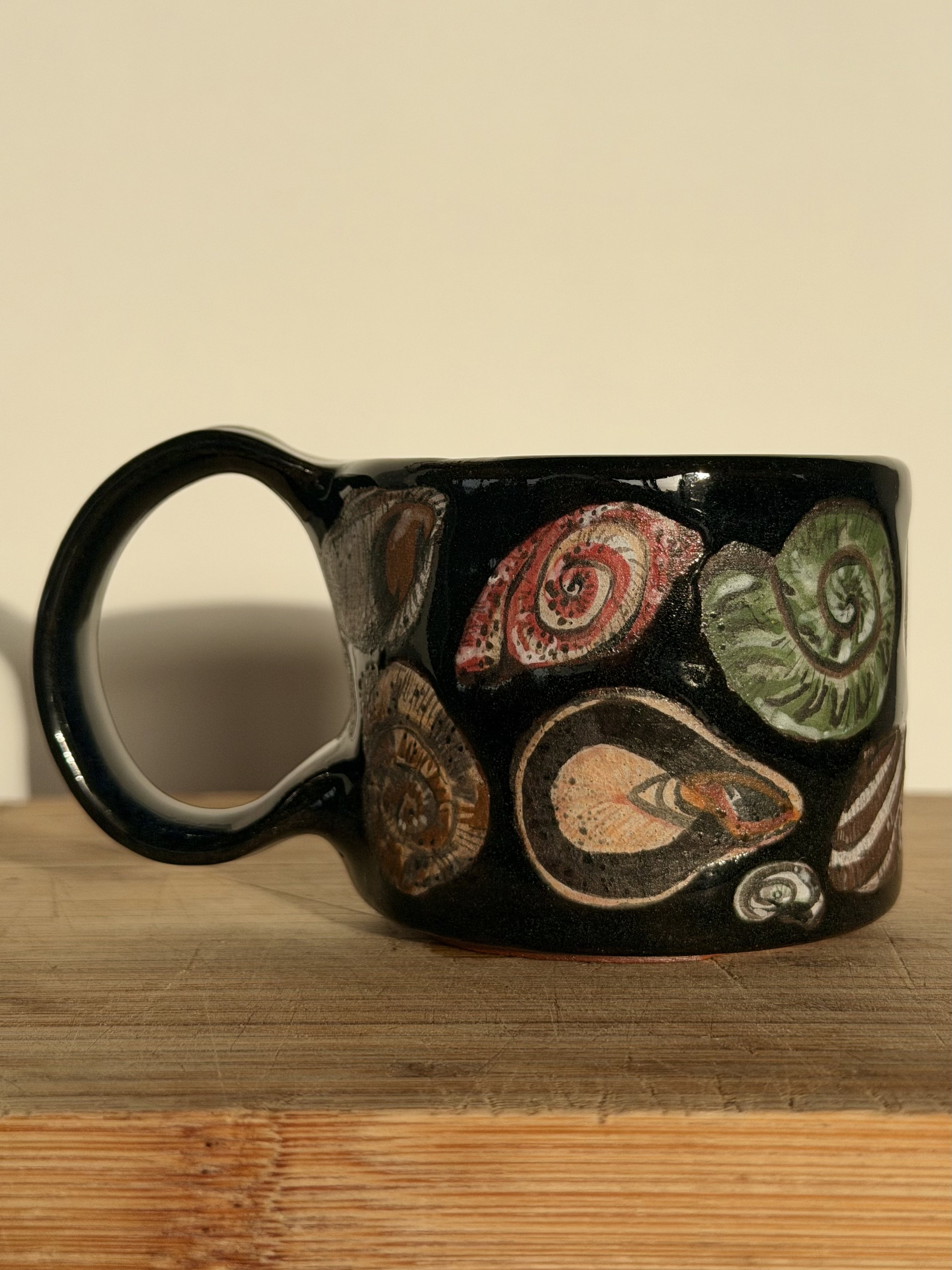 Shells on her mug