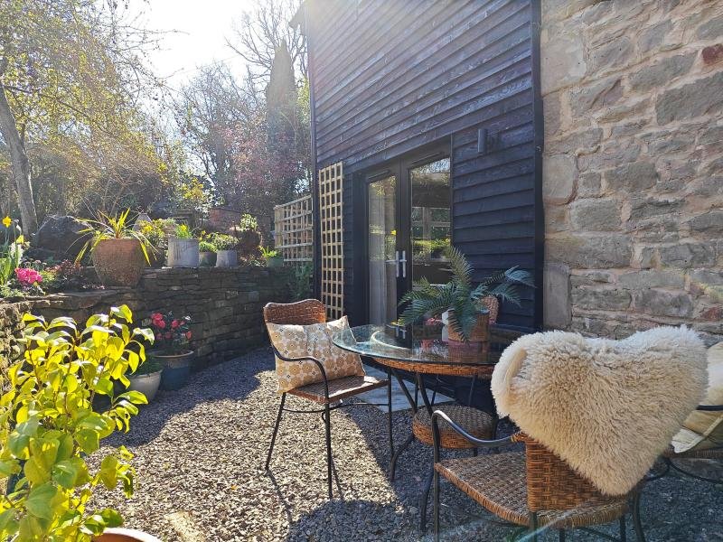 Patio area within the enclosed garden
