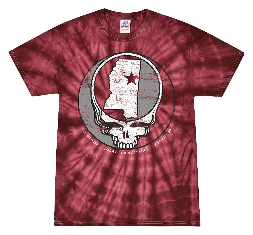 Red tie-dye T-shirt with a large graphic of a skull containing the outline of Oregon and a star in the middle, with the text "Two Brothers Sorry for Partying Starkville, MS" around the skull.