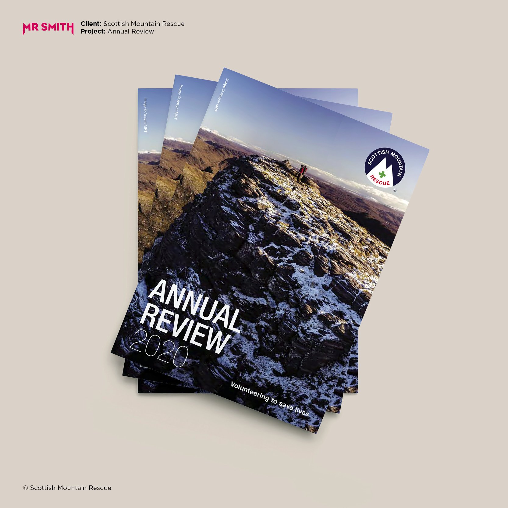 Annual review brochure for Scottish Mountain Rescue, featuring a mountain landscape with two people on a rocky ridge, and Scottish Mountain Rescue logo in the corner.