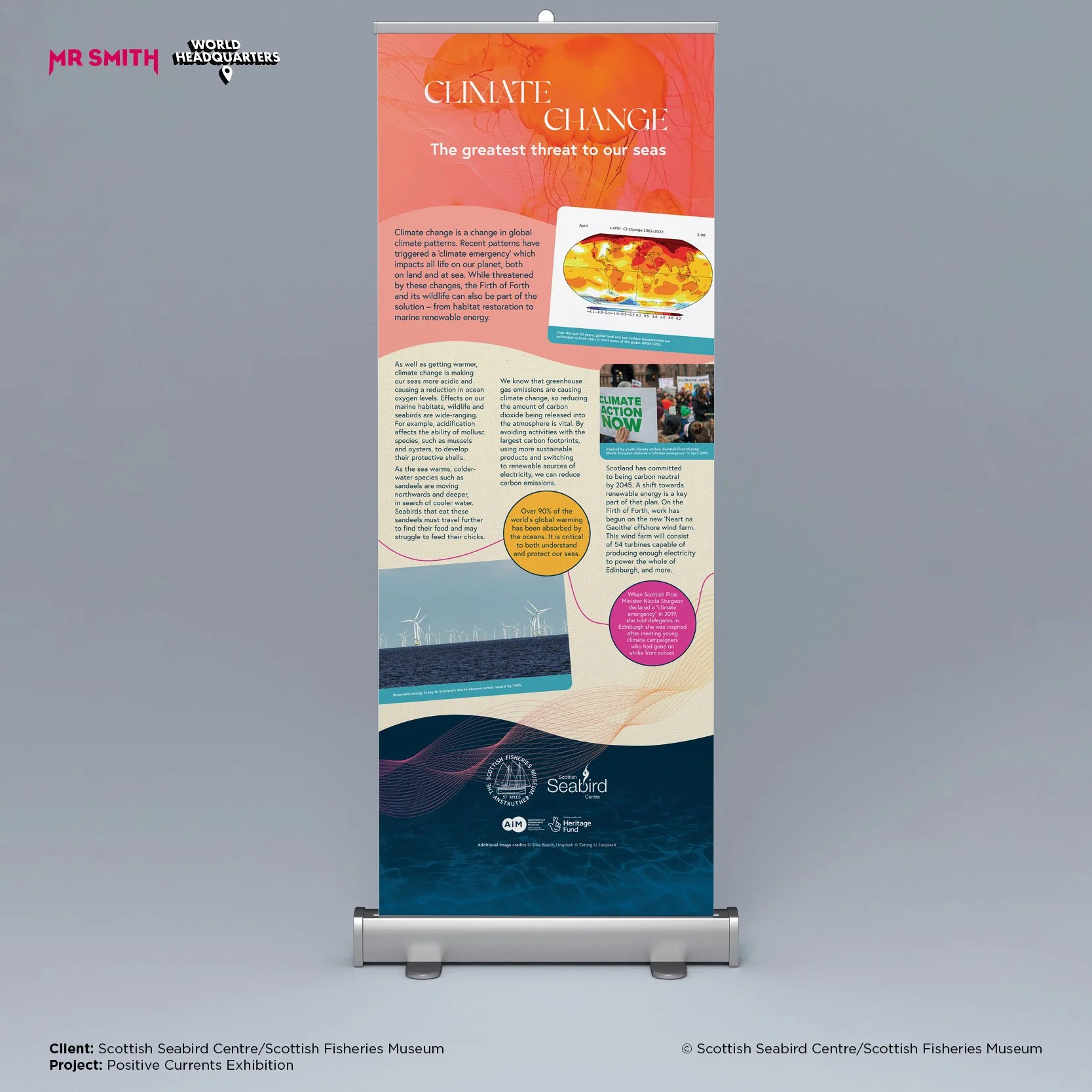 Exhibition banner about climate change featuring a map of global temperature changes, a protest photo with a sign reading 'Climate Action Now,' wind turbines in the ocean, and logos of the Scottish Seabird Centre and Scottish Fisheries Museum.