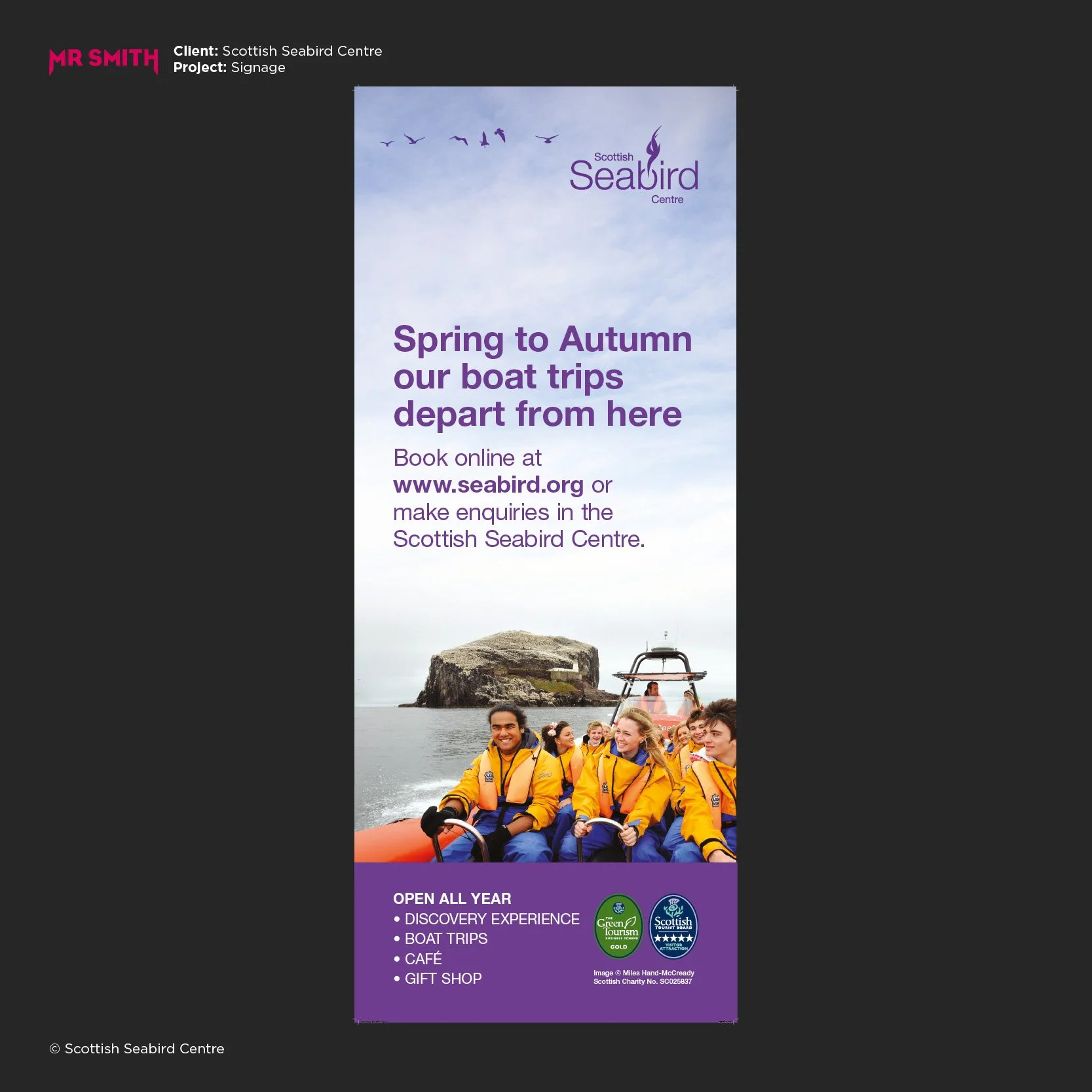 A group of young people wearing yellow life jackets enjoying a boat trip on the water with a rocky island in the background, part of an advertisement for Scottish Seabird Centre promoting boat trips, discovery experience, café, gift shop, and opening