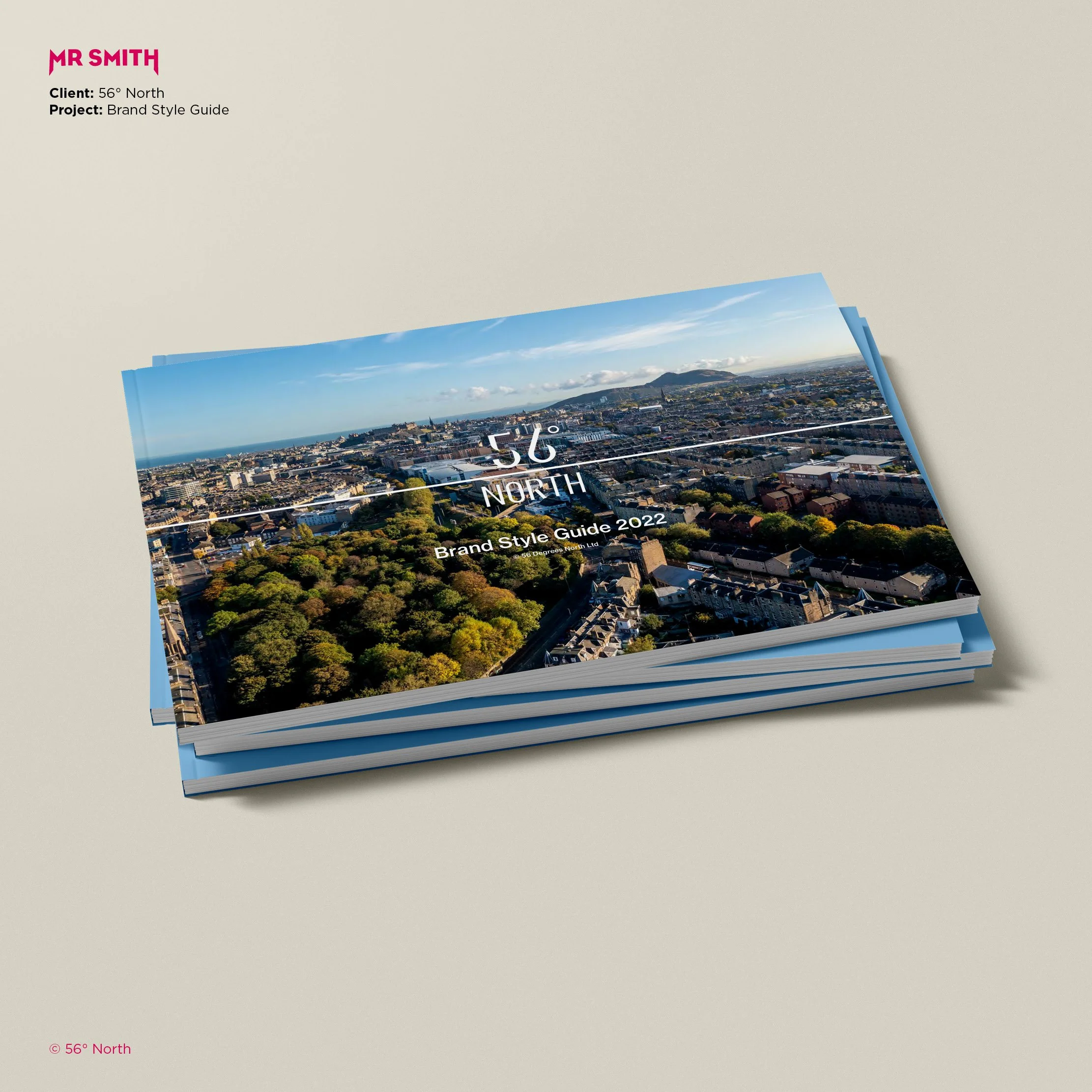 Cover page of a brand style guide for Mr. Smith, featuring a cityscape photograph with blue sky, mountains, and buildings, and the text '56° North'.
