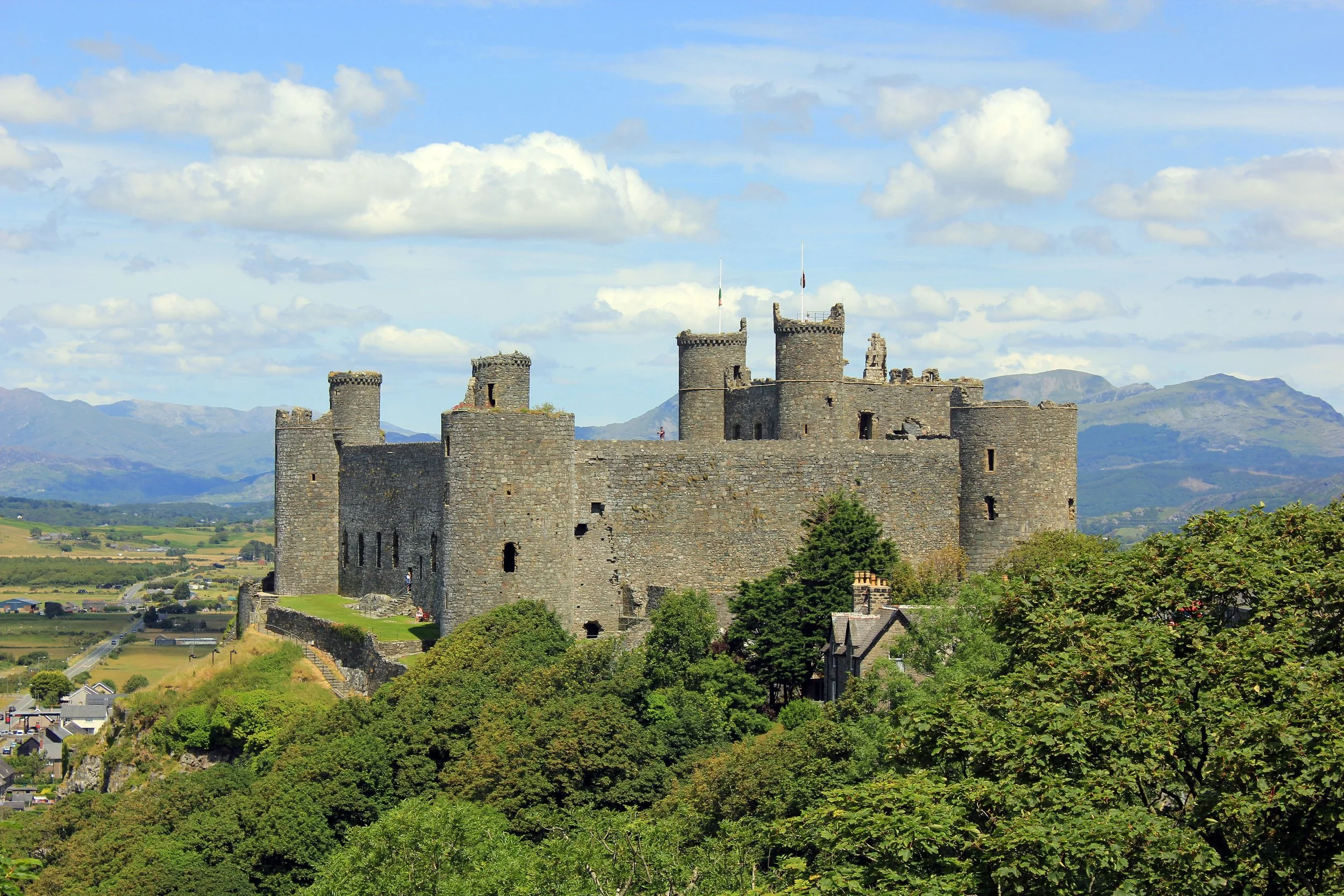 Harlech Castle on its rocky outcrop above the coastal plain