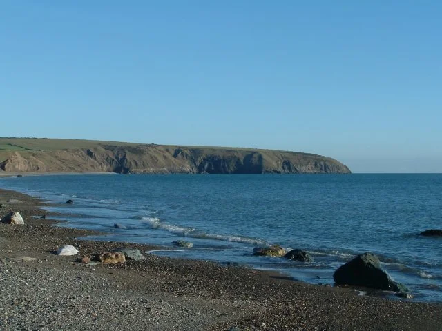 Aberdaron beach on the Llŷn Peninsula under a soft sky