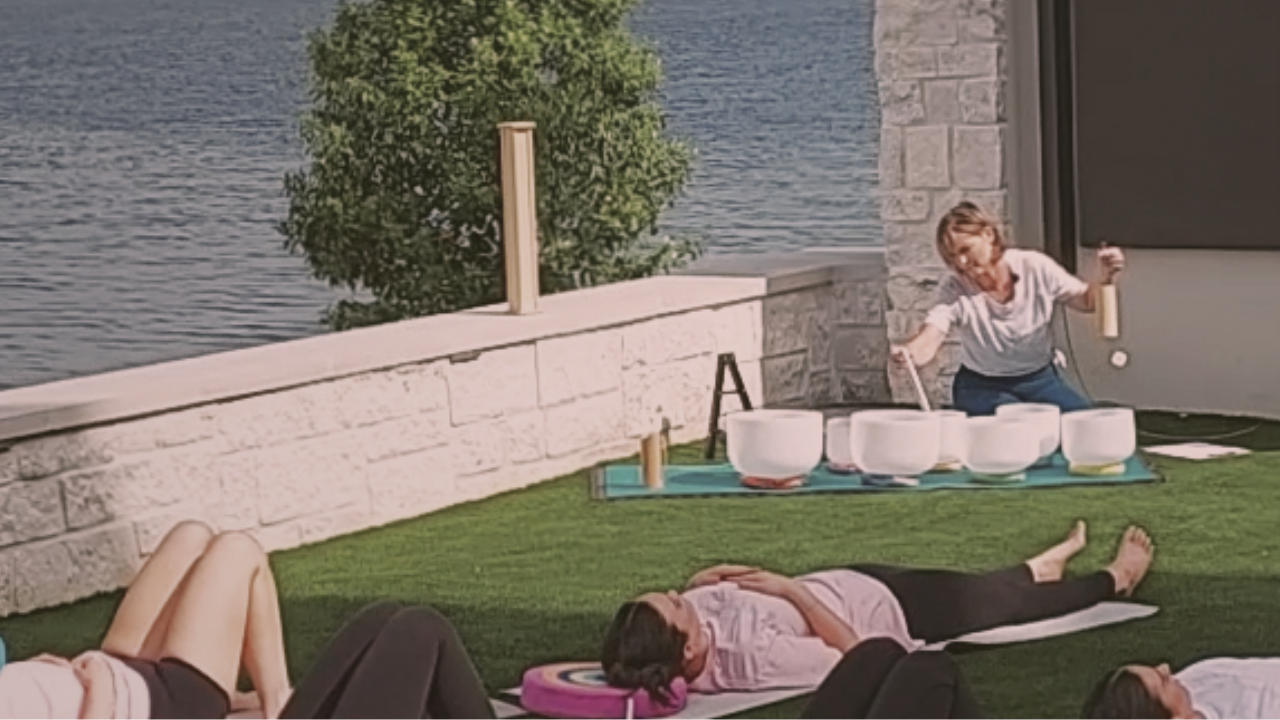 Leah Ann Hill leading a private bachelorette party sound bath experience, creating a unique and meaningful group celebration through guided sound and relaxation.