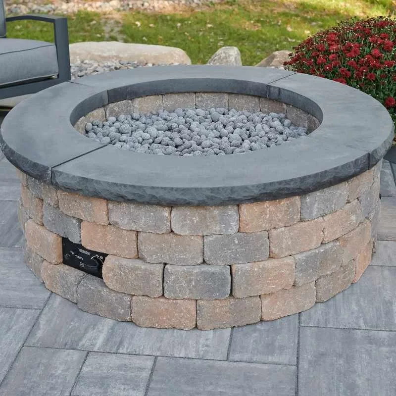 BronsonBlockRoundGasFirePitKitPlacedatFrontyardwithCharcoalGreyTopsandTumbledLavaRockScaled_800x800.jpg