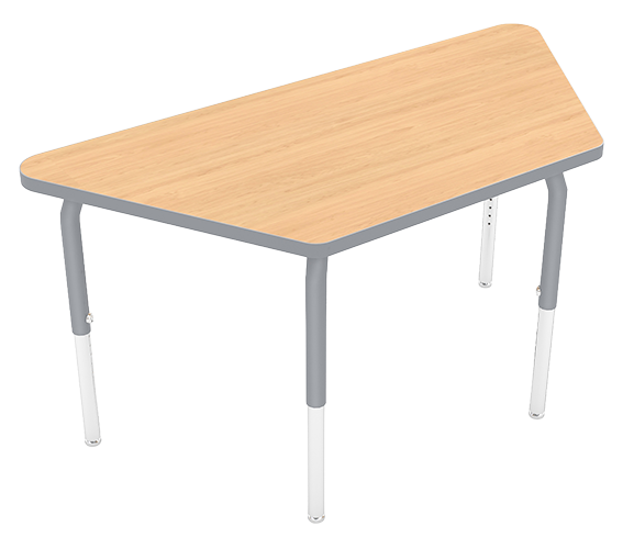 A small light brown classroom desk with gray metal legs and a white plastic footrest.