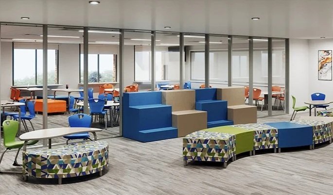 Modern office lounge with colorful seating areas, open workspace, and glass partition walls.