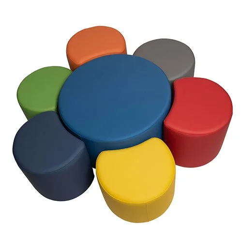 Colorful round seats arranged in a circle, including blue, yellow, black, red, gray, orange, and green.