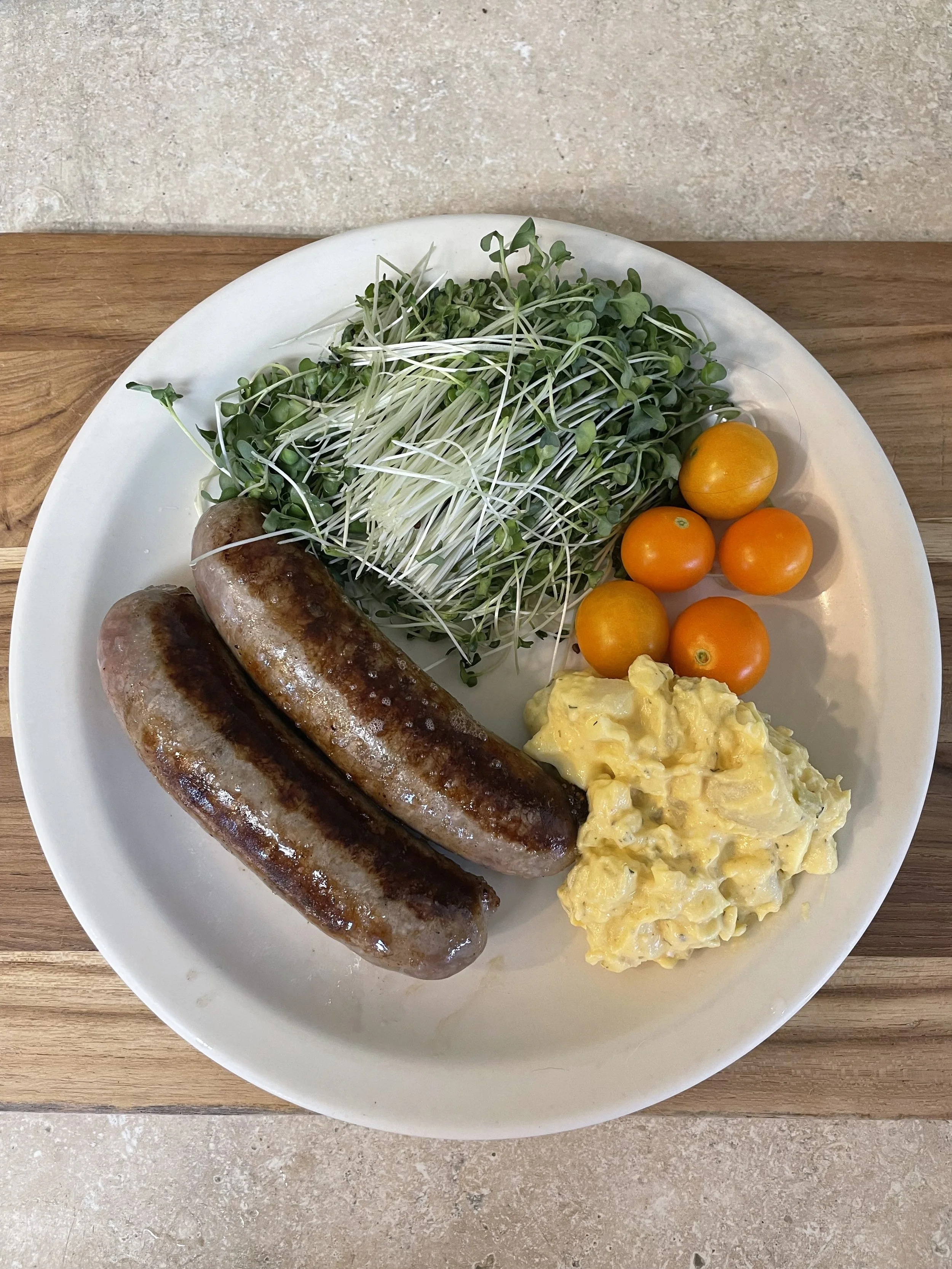 Broccoli, Brats, Tomatoes, Potato Salad (at home)