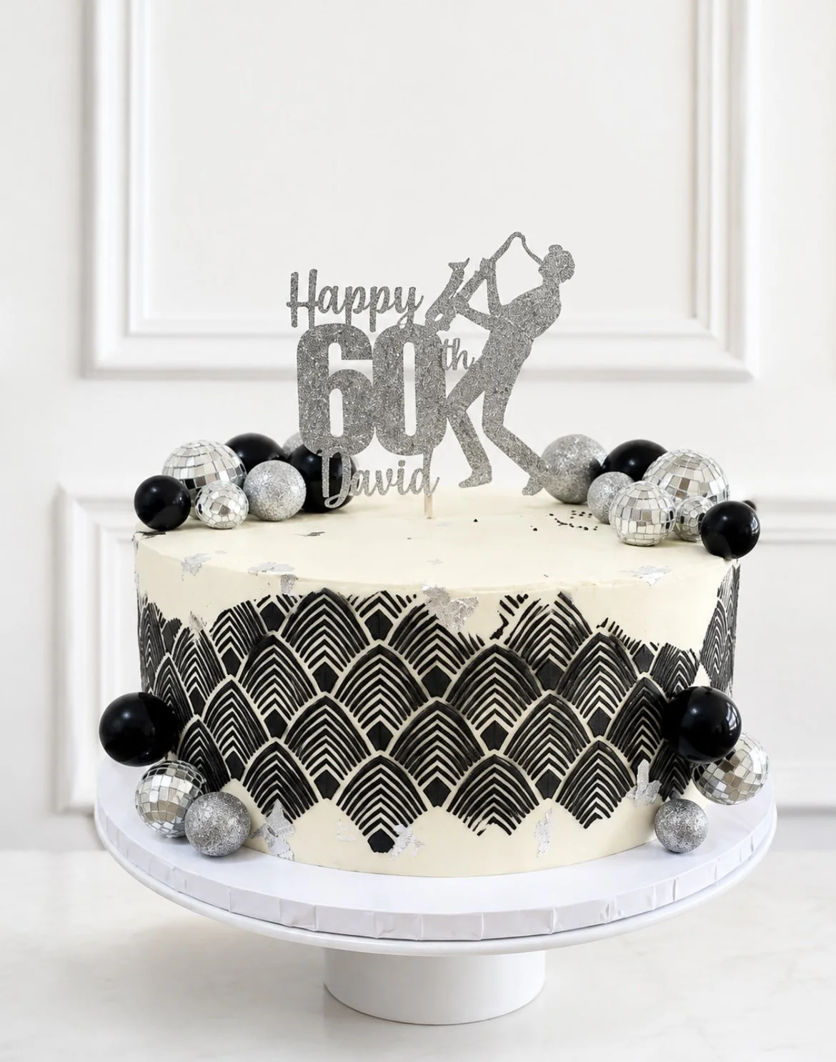 Disco and saxophone-themed 60th birthday cake