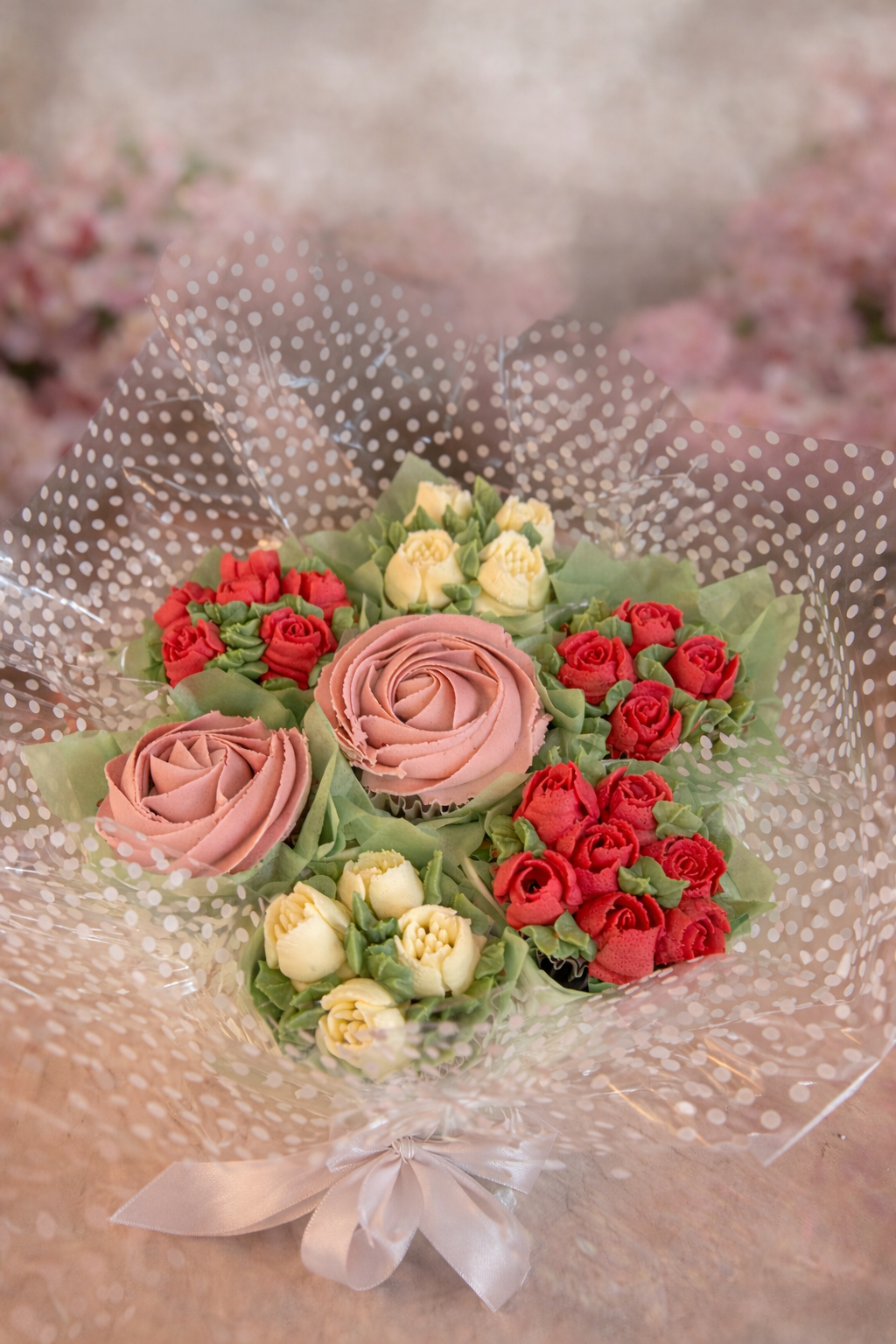 Cupcake bouquet with piped buttercream roses and flowers