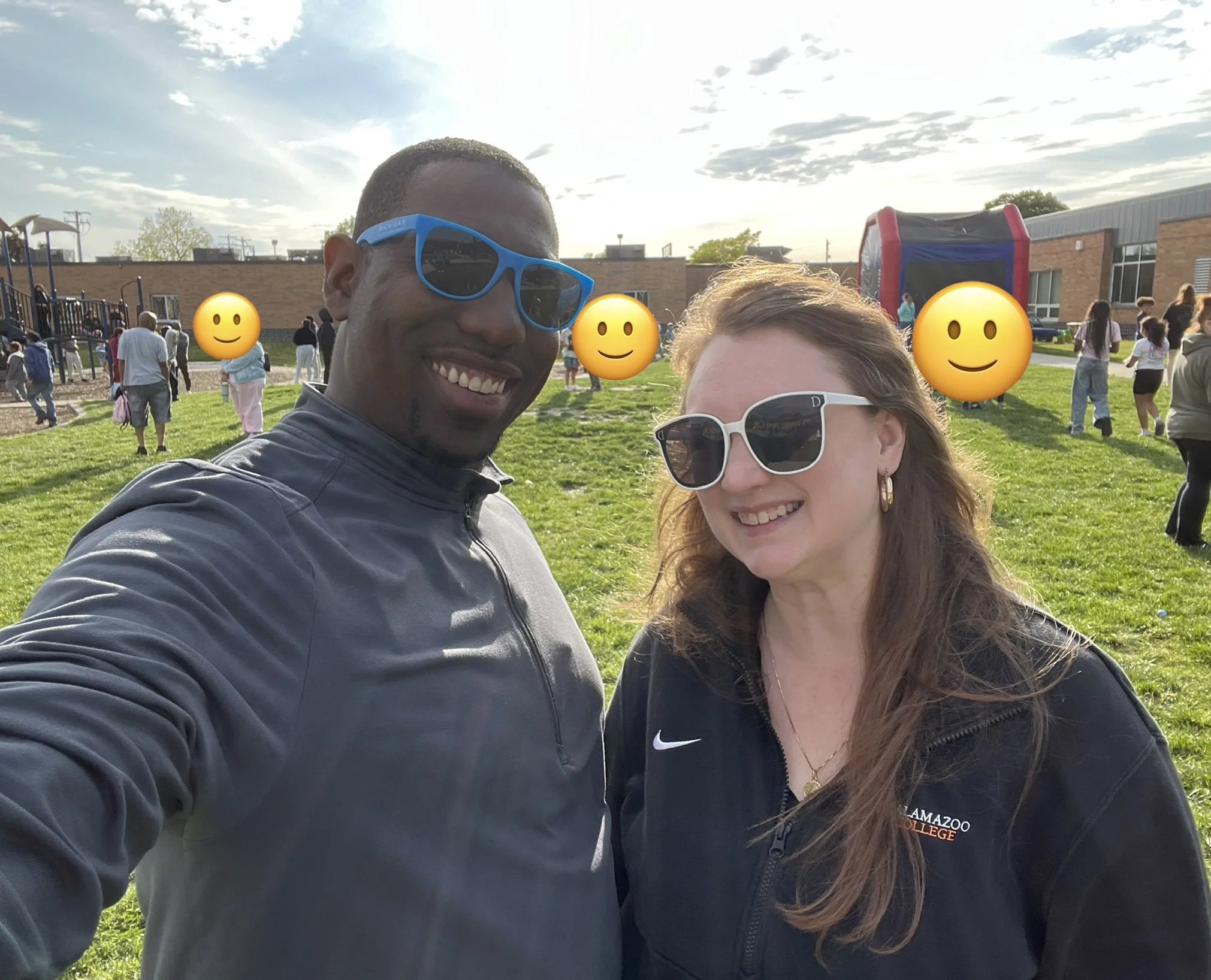 Caitlin and her husband pose at his school's carnival event!