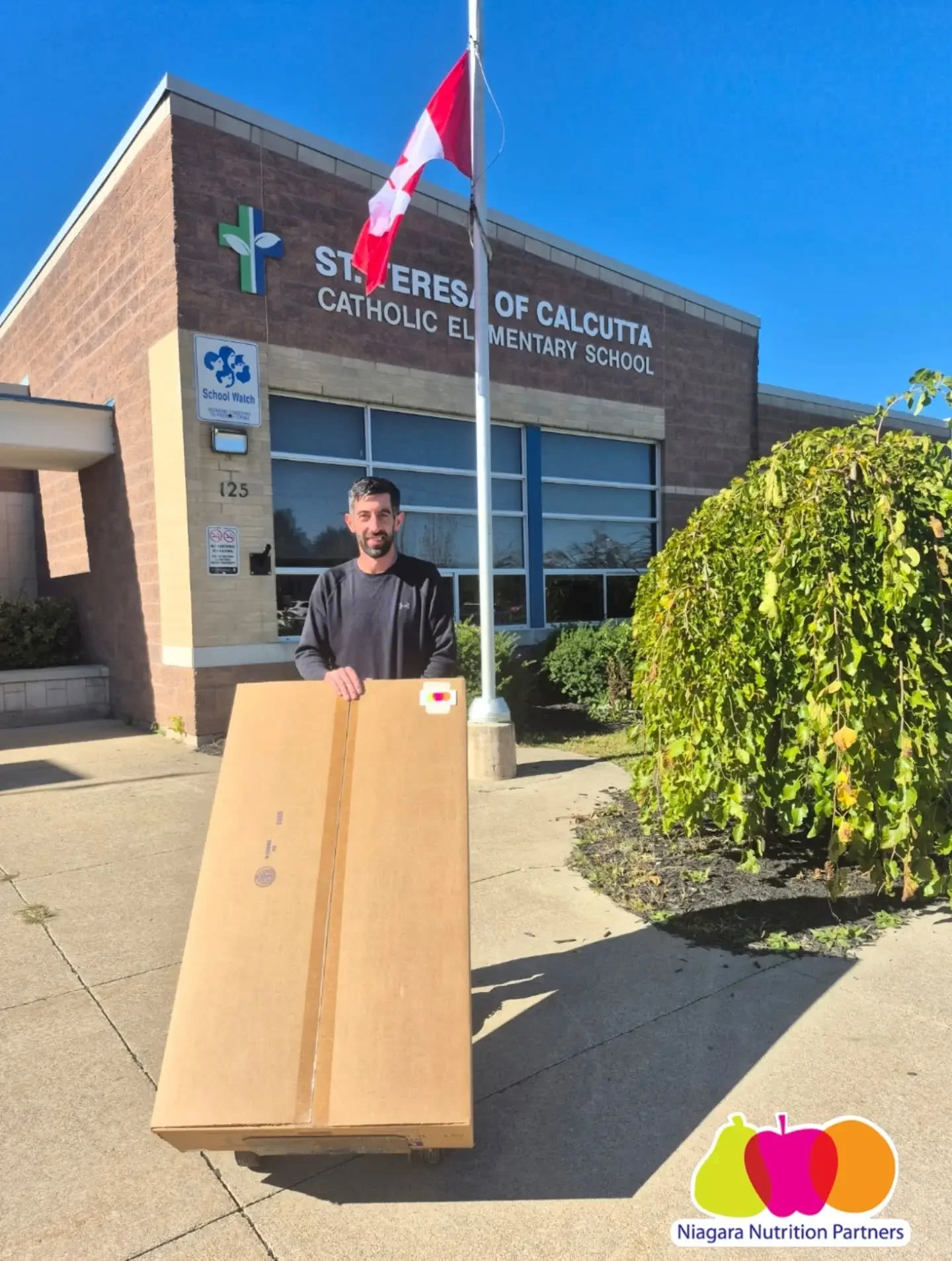 Josh Cassolato, caretaker at St. Teresa of Calcutta in St. Catharines graciously helped us load a brand new cart into the school. This cart, donated by NNP will help the school distribute fresh, nutritious food to students to keep their energy and fo