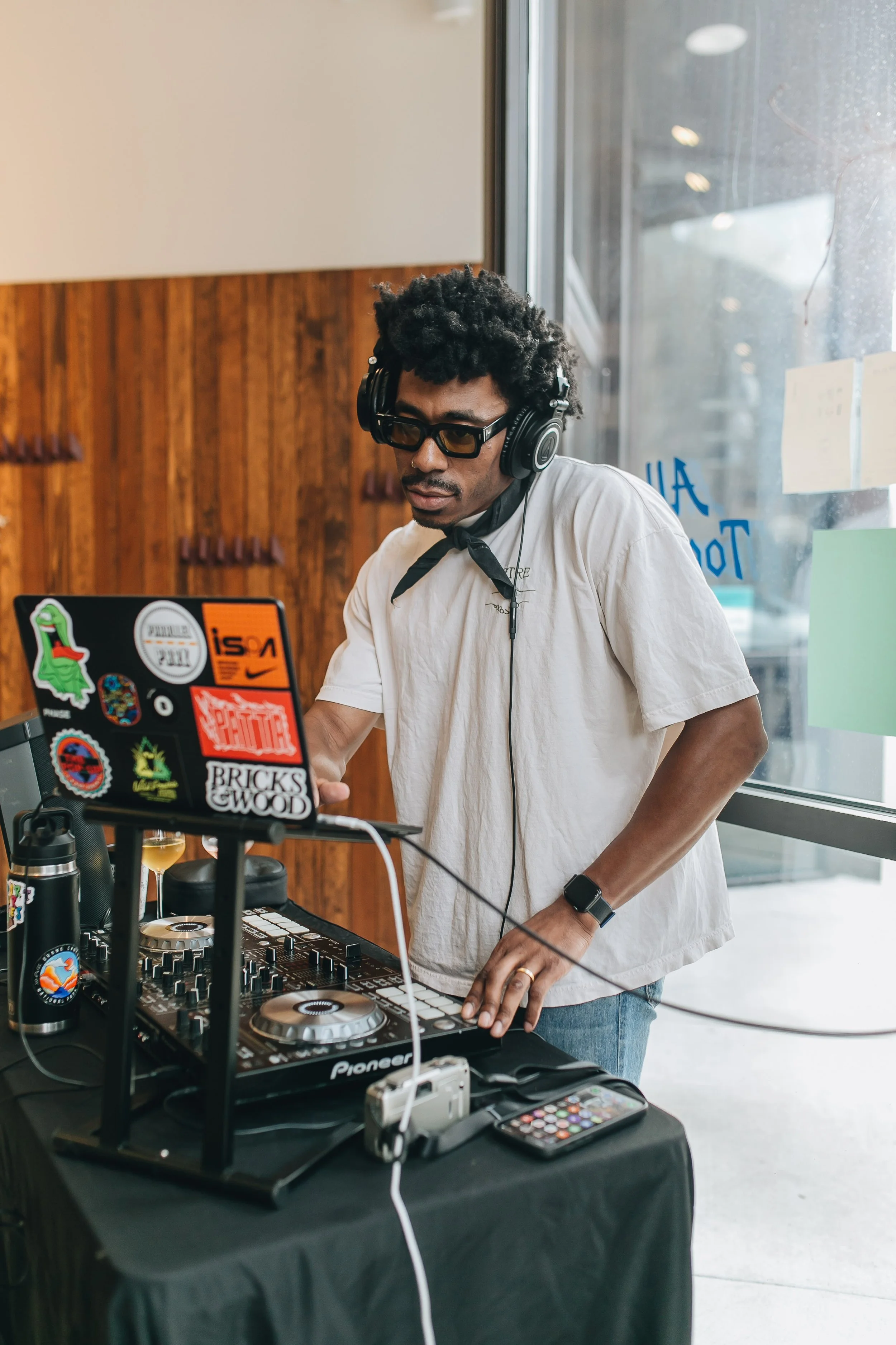 A cool guy spinning records at All Together Now