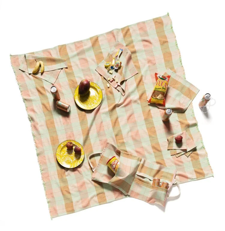 A Chicago-made set of picnic textiles, including a picnic blanket