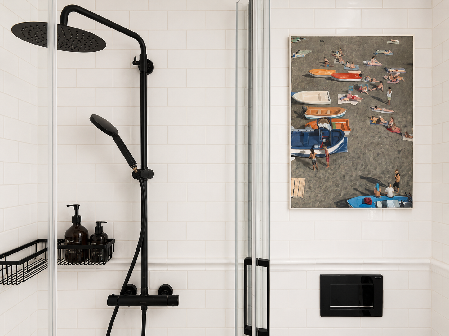 A shower with white subway tiles, a black shower head and hand shower, a black basket with personal care products, a framed blue abstract art piece, and a window with striped curtains.