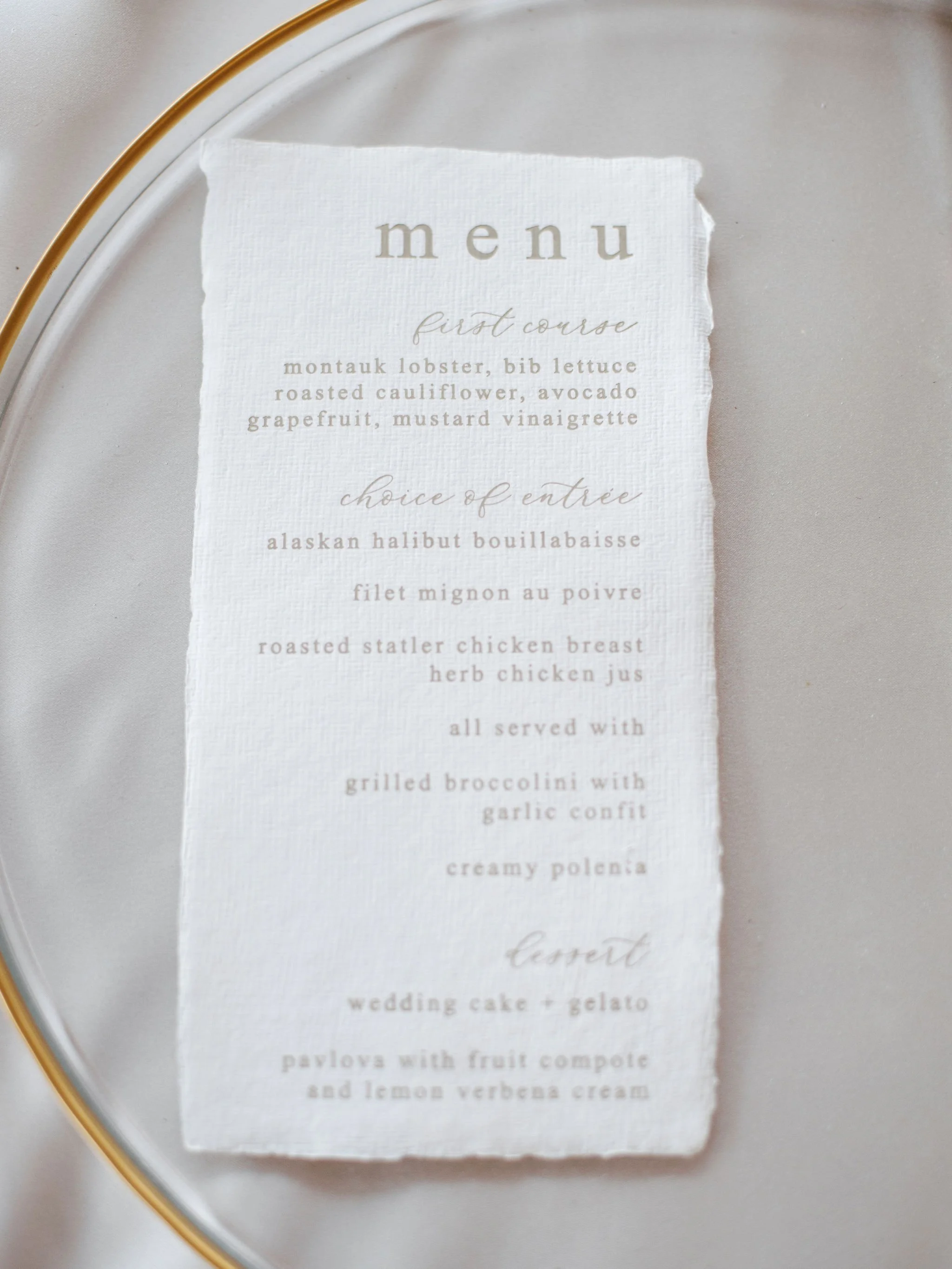 A tactile expression of understated elegance, the dinner menu was printed on handmade paper with softly deckled edges—its delicate typography and neutral palette seamlessly echoing the refined coastal aesthetic.