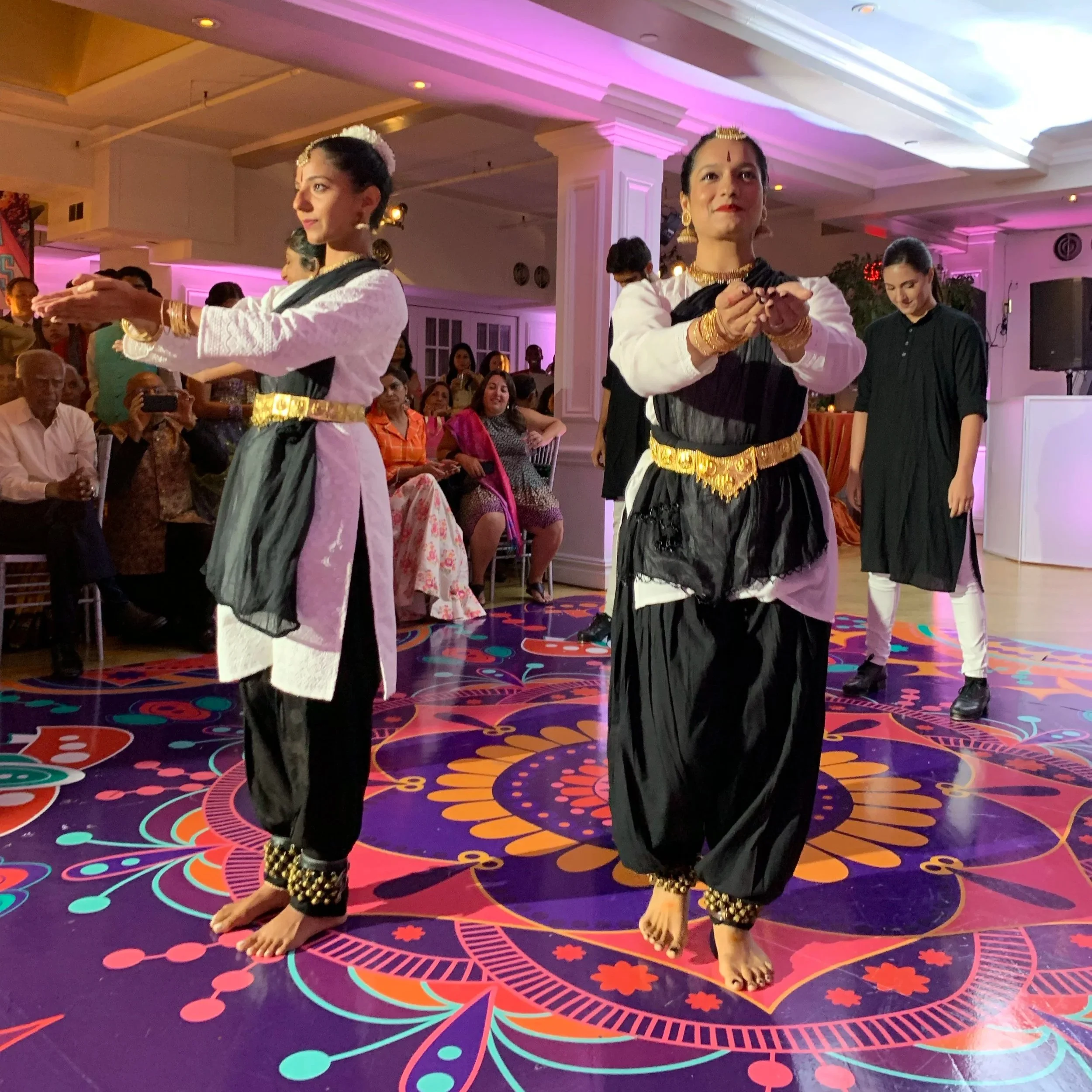 Dancers perform at the Manhattan Penthouse for a Sangeet the night before the wedding.