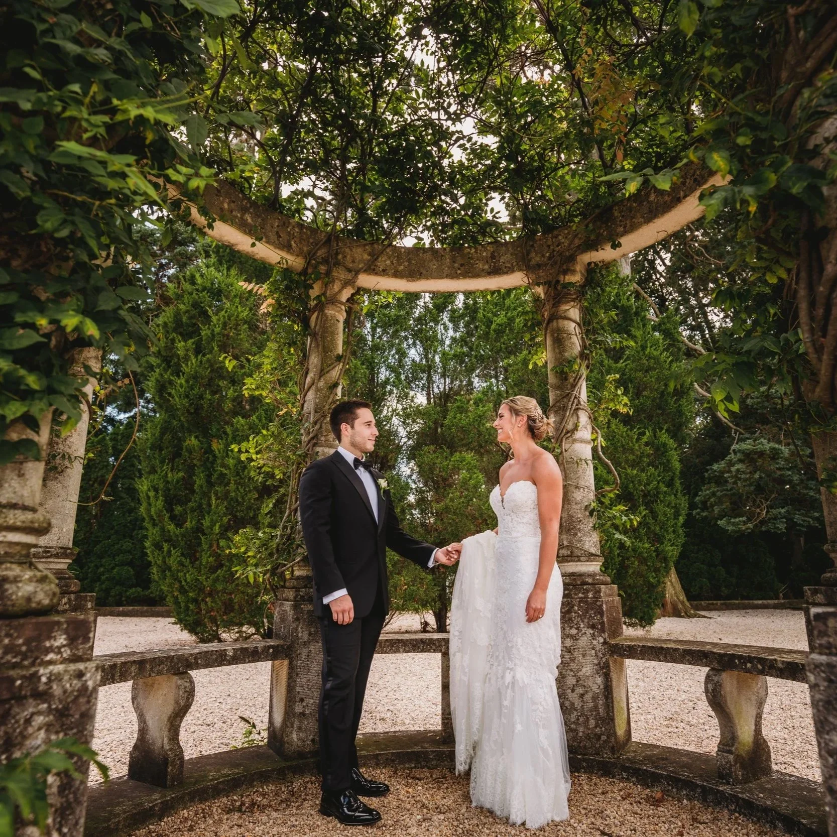 Bride and Groom portrait in the stone gazebo at Oheka Castle 
