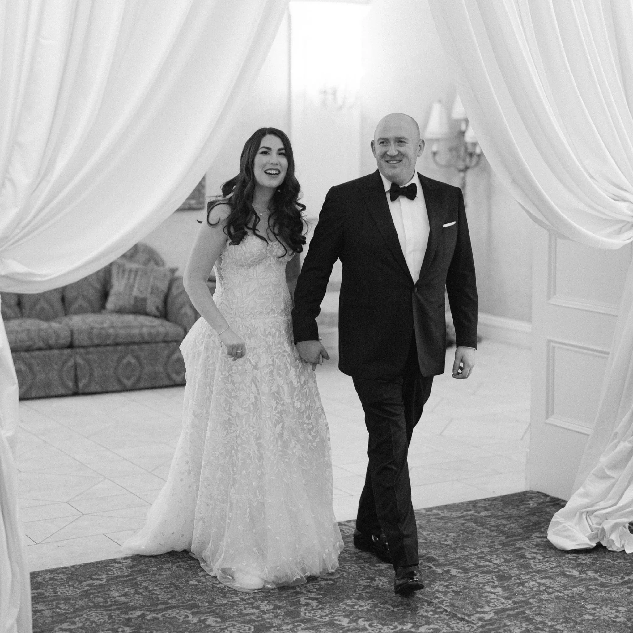 Couple ballroom reveal moments before their wedding reception at Oheka Castle 
