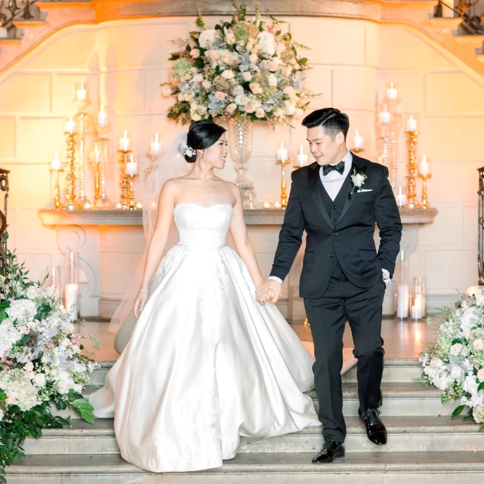 Bride and Groom portrait on the grand staircase at Oheka Castle 